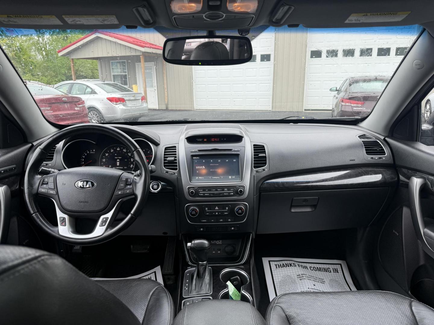 2014 Black /Black Kia Sorento SX V6 AWD (5XYKWDA78EG) with an 3.3L V6 DOHC 24V engine, 6-Speed Automatic transmission, located at 547 E. Main St., Orwell, OH, 44076, (440) 437-5893, 41.535435, -80.847855 - This 2014 Kia Sorento is a fully loaded family hauler. Equipped with Kia's 3.3 GDI V6 and a tried and true 6 speed automatic transmission it can haul 7 people and tow up to 3,500 pounds. On the inside you will find a luxurious leather interior, heated and cooled front seats, a 10 speaker Infinity su - Photo#37