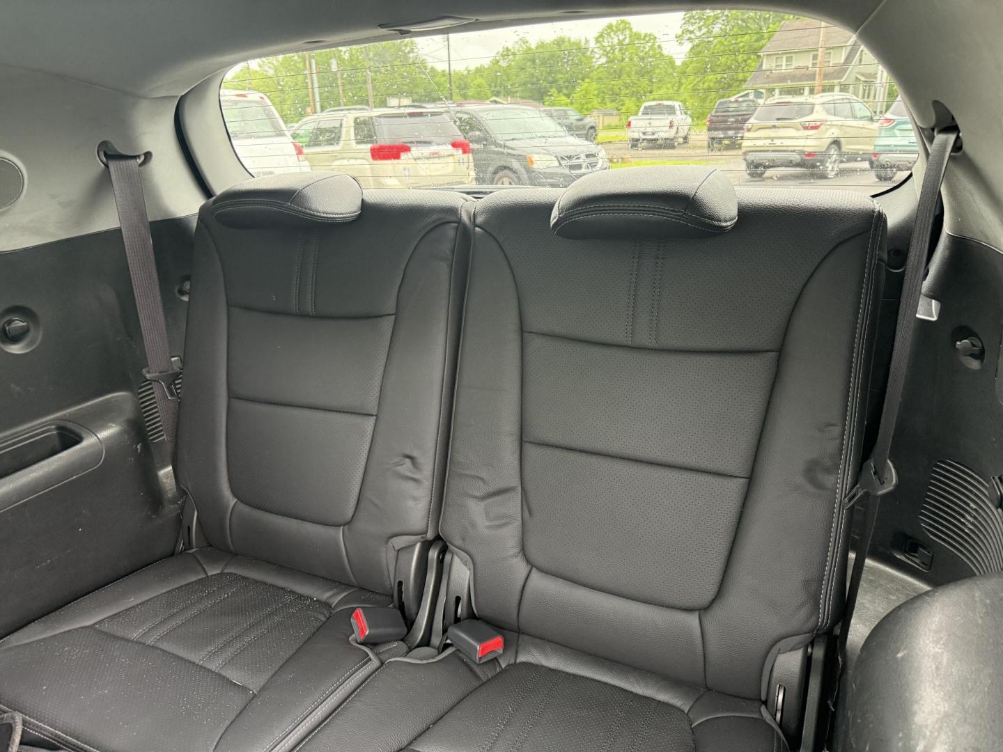 2014 Black /Black Kia Sorento SX V6 AWD (5XYKWDA78EG) with an 3.3L V6 DOHC 24V engine, 6-Speed Automatic transmission, located at 547 E. Main St., Orwell, OH, 44076, (440) 437-5893, 41.535435, -80.847855 - This 2014 Kia Sorento is a fully loaded family hauler. Equipped with Kia's 3.3 GDI V6 and a tried and true 6 speed automatic transmission it can haul 7 people and tow up to 3,500 pounds. On the inside you will find a luxurious leather interior, heated and cooled front seats, a 10 speaker Infinity su - Photo#38