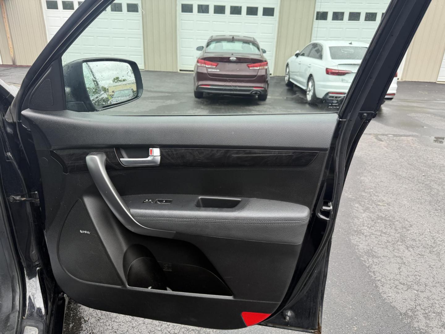2014 Black /Black Kia Sorento SX V6 AWD (5XYKWDA78EG) with an 3.3L V6 DOHC 24V engine, 6-Speed Automatic transmission, located at 547 E. Main St., Orwell, OH, 44076, (440) 437-5893, 41.535435, -80.847855 - This 2014 Kia Sorento is a fully loaded family hauler. Equipped with Kia's 3.3 GDI V6 and a tried and true 6 speed automatic transmission it can haul 7 people and tow up to 3,500 pounds. On the inside you will find a luxurious leather interior, heated and cooled front seats, a 10 speaker Infinity su - Photo#46