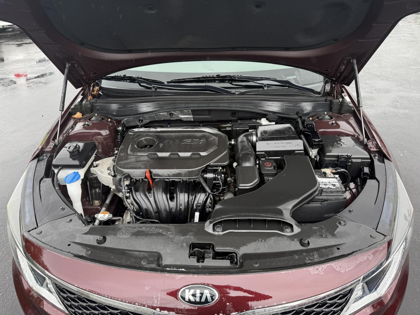 2017 Red /Sangria Kia Optima LX FE (5XXGT4L36HG) with an 2.4L I4 DOHC 16V engine, 6A transmission, located at 547 E. Main St., Orwell, OH, 44076, (440) 437-5893, 41.535435, -80.847855 - Photo#3