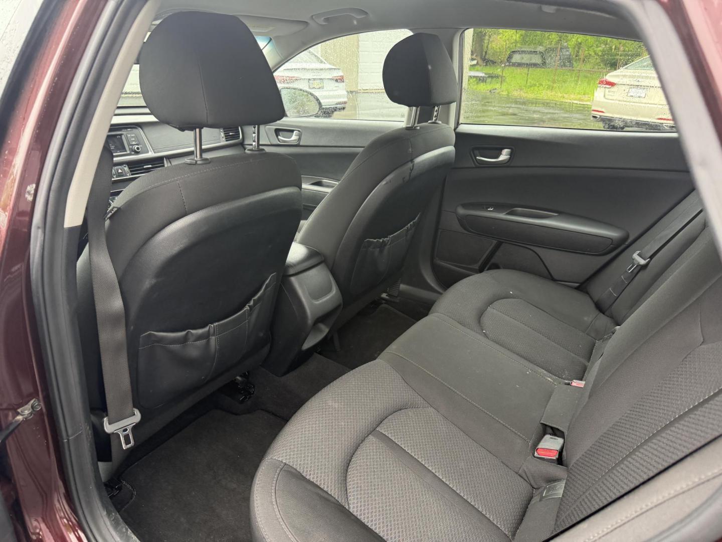 2017 Red /Sangria Kia Optima LX FE (5XXGT4L36HG) with an 2.4L I4 DOHC 16V engine, 6A transmission, located at 547 E. Main St., Orwell, OH, 44076, (440) 437-5893, 41.535435, -80.847855 - Photo#24