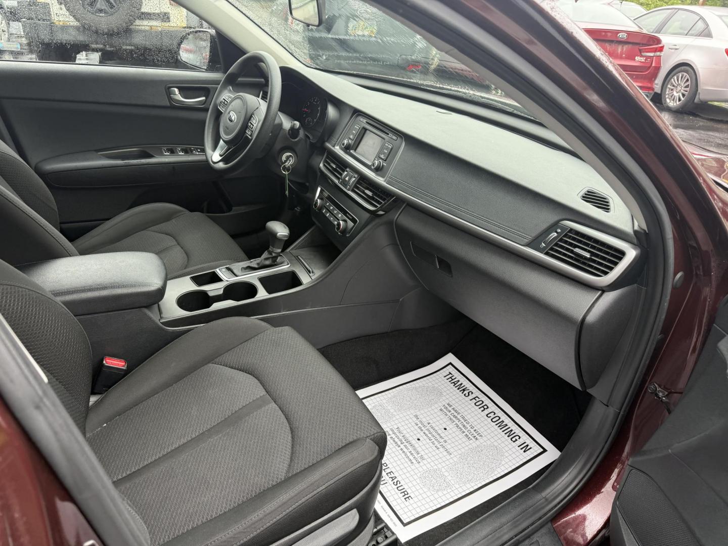 2017 Red /Sangria Kia Optima LX FE (5XXGT4L36HG) with an 2.4L I4 DOHC 16V engine, 6A transmission, located at 547 E. Main St., Orwell, OH, 44076, (440) 437-5893, 41.535435, -80.847855 - Photo#31