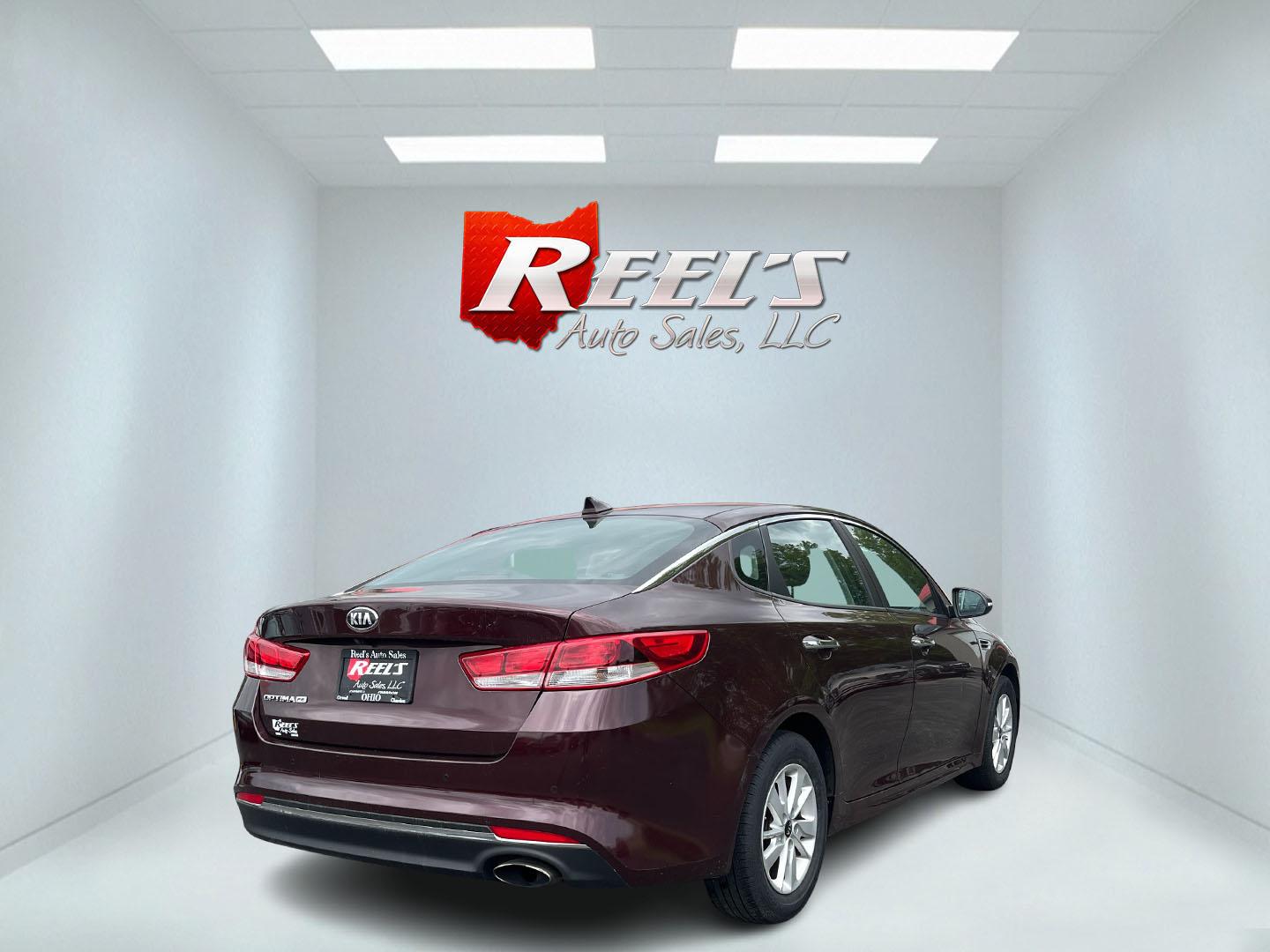 2017 Red /Sangria Kia Optima LX FE (5XXGT4L36HG) with an 2.4L I4 DOHC 16V engine, 6A transmission, located at 547 E. Main St., Orwell, OH, 44076, (440) 437-5893, 41.535435, -80.847855 - Photo#36