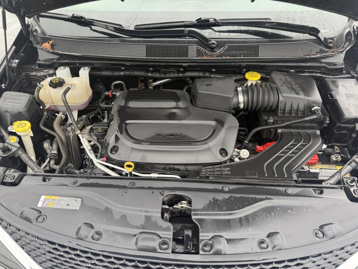 2021 Gray /Black Chrysler Voyager LXI (2C4RC1DG9MR) with an 3.6L V6 DOHC 24V engine, 9A transmission, located at 547 E. Main St., Orwell, OH, 44076, (440) 437-5893, 41.535435, -80.847855 - Photo#3