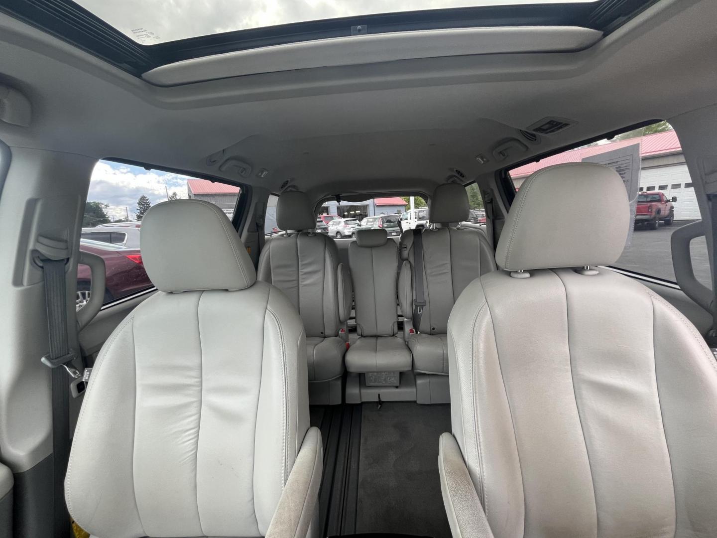 2012 Silver /Gray Toyota Sienna XLE FWD 8-Passsenger V6 (5TDYK3DCXCS) with an 3.5L V6 EFI DOHC 24V engine, 5-Speed Automatic transmission, located at 547 E. Main St., Orwell, OH, 44076, (440) 437-5893, 41.535435, -80.847855 - This One Owner 2012 Toyota Sienna is a reliable and luxurious family hauler. Powered by Toyota's incredible 3.5 V6 engine and 6 speed automatic transmission you'll never be longing for power while passing while achieving a respectable 25 MPG highway. On the inside you will find a leather interior, t - Photo#31