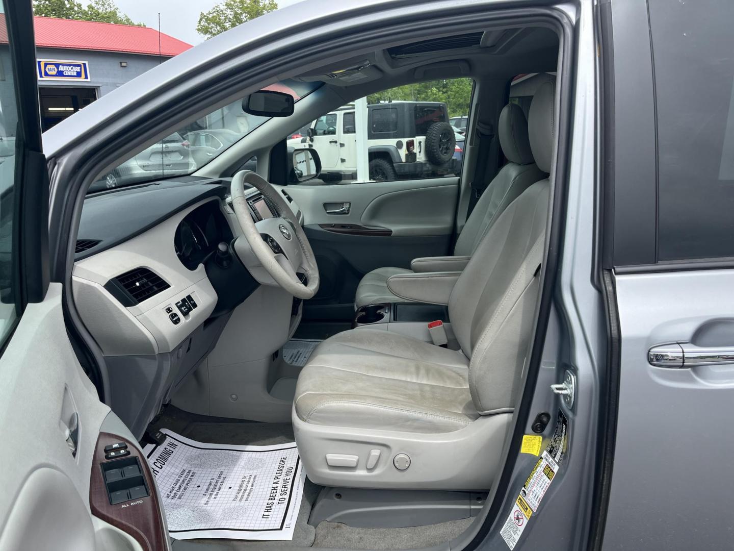 2012 Silver /Gray Toyota Sienna XLE FWD 8-Passsenger V6 (5TDYK3DCXCS) with an 3.5L V6 EFI DOHC 24V engine, 5-Speed Automatic transmission, located at 547 E. Main St., Orwell, OH, 44076, (440) 437-5893, 41.535435, -80.847855 - This One Owner 2012 Toyota Sienna is a reliable and luxurious family hauler. Powered by Toyota's incredible 3.5 V6 engine and 6 speed automatic transmission you'll never be longing for power while passing while achieving a respectable 25 MPG highway. On the inside you will find a leather interior, t - Photo#24