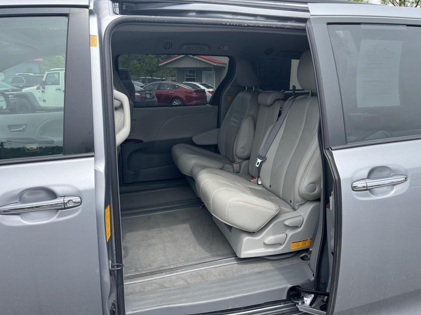 2012 Silver /Gray Toyota Sienna XLE FWD 8-Passsenger V6 (5TDYK3DCXCS) with an 3.5L V6 EFI DOHC 24V engine, 5-Speed Automatic transmission, located at 547 E. Main St., Orwell, OH, 44076, (440) 437-5893, 41.535435, -80.847855 - This One Owner 2012 Toyota Sienna is a reliable and luxurious family hauler. Powered by Toyota's incredible 3.5 V6 engine and 6 speed automatic transmission you'll never be longing for power while passing while achieving a respectable 25 MPG highway. On the inside you will find a leather interior, t - Photo#33