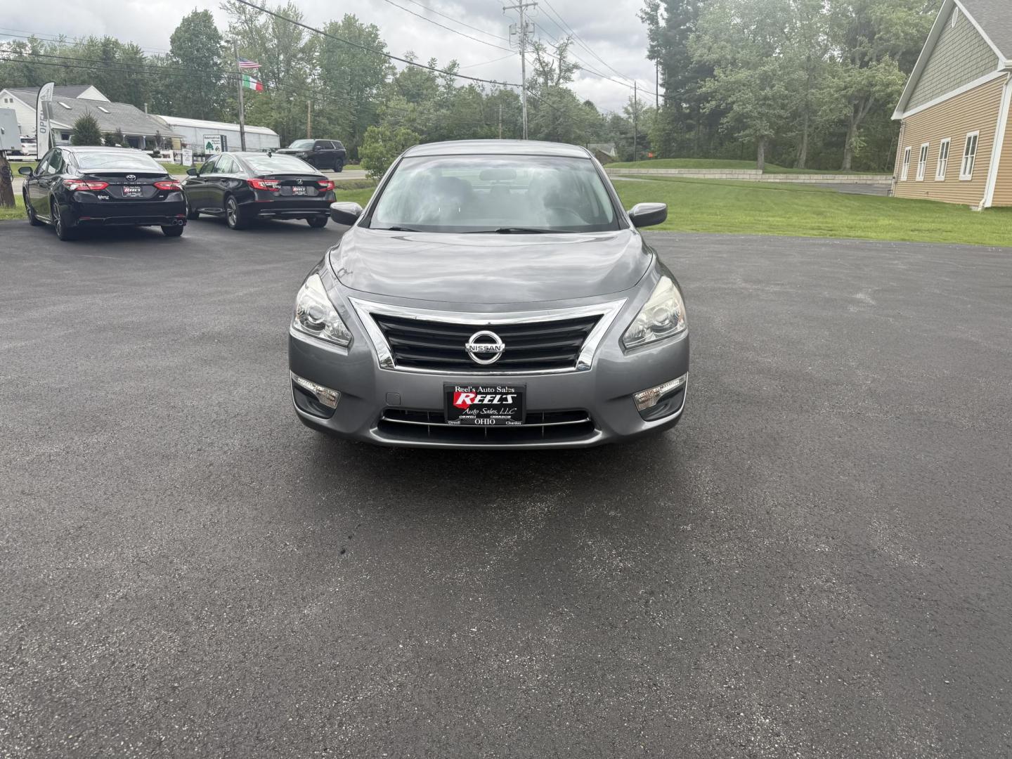 2015 Gray /Black Nissan Altima 2.5 S (1N4AL3AP0FC) with an 2.5L I4 DOHC 16V engine, Automatic transmission, located at 11115 Chardon Rd. , Chardon, OH, 44024, (440) 214-9705, 41.580246, -81.241943 - This One Owner 2015 Nissan Altima is an incredibly fuel efficient commuter sedan. Powered by a 2.5 I4 engine it gets 31 MPG combined and up to 37 MPG highway. On the side you get a power drivers seat, push button start, a sport driving mode, and an aux audio input. This Altima is fully serviced and - Photo#1