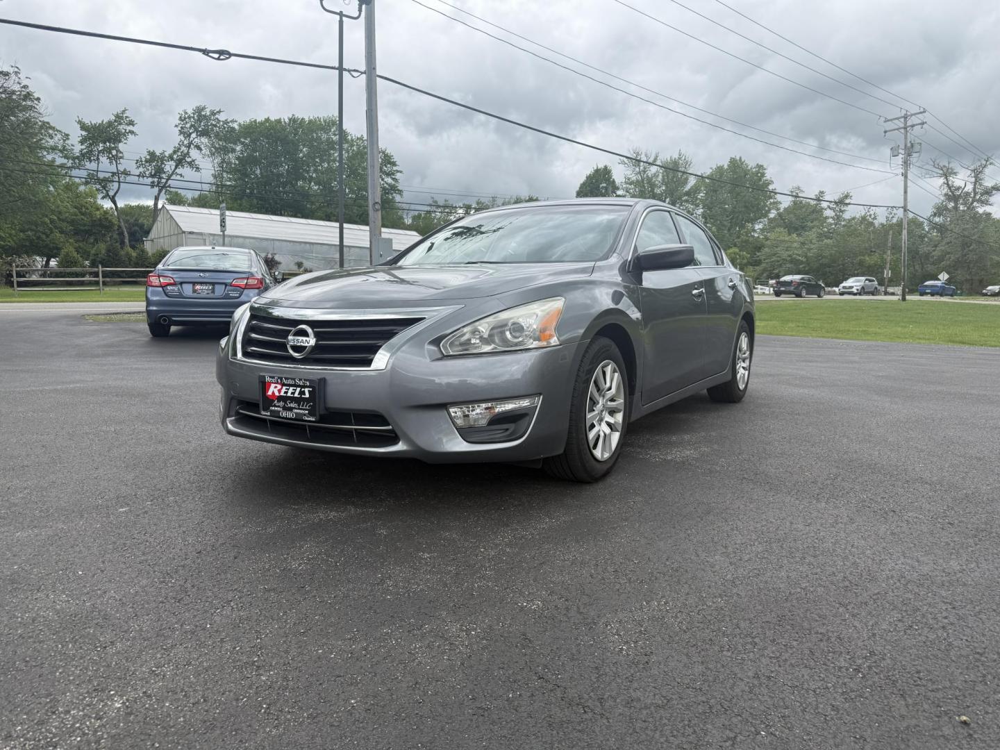 2015 Gray /Black Nissan Altima 2.5 S (1N4AL3AP0FC) with an 2.5L I4 DOHC 16V engine, Automatic transmission, located at 11115 Chardon Rd. , Chardon, OH, 44024, (440) 214-9705, 41.580246, -81.241943 - This One Owner 2015 Nissan Altima is an incredibly fuel efficient commuter sedan. Powered by a 2.5 I4 engine it gets 31 MPG combined and up to 37 MPG highway. On the side you get a power drivers seat, push button start, a sport driving mode, and an aux audio input. This Altima is fully serviced and - Photo#0