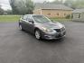 2015 Gray /Black Nissan Altima 2.5 S (1N4AL3AP0FC) with an 2.5L I4 DOHC 16V engine, Automatic transmission, located at 11115 Chardon Rd. , Chardon, OH, 44024, (440) 214-9705, 41.580246, -81.241943 - This One Owner 2015 Nissan Altima is an incredibly fuel efficient commuter sedan. Powered by a 2.5 I4 engine it gets 31 MPG combined and up to 37 MPG highway. On the side you get a power drivers seat, push button start, a sport driving mode, and an aux audio input. This Altima is fully serviced and - Photo#2
