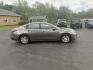 2015 Gray /Black Nissan Altima 2.5 S (1N4AL3AP0FC) with an 2.5L I4 DOHC 16V engine, Automatic transmission, located at 11115 Chardon Rd. , Chardon, OH, 44024, (440) 214-9705, 41.580246, -81.241943 - This One Owner 2015 Nissan Altima is an incredibly fuel efficient commuter sedan. Powered by a 2.5 I4 engine it gets 31 MPG combined and up to 37 MPG highway. On the side you get a power drivers seat, push button start, a sport driving mode, and an aux audio input. This Altima is fully serviced and - Photo#5