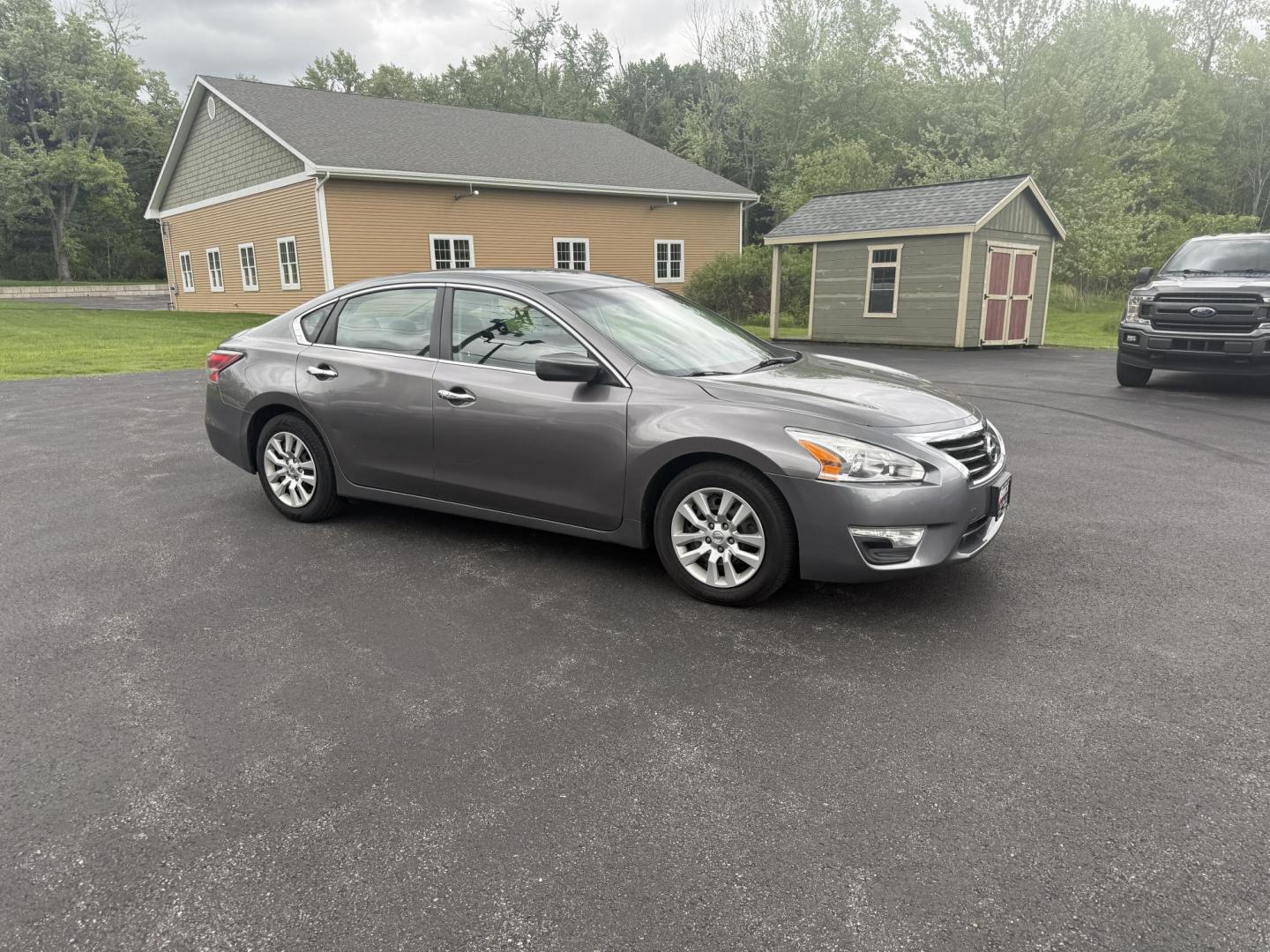 2015 Gray /Black Nissan Altima 2.5 S (1N4AL3AP0FC) with an 2.5L I4 DOHC 16V engine, Automatic transmission, located at 11115 Chardon Rd. , Chardon, OH, 44024, (440) 214-9705, 41.580246, -81.241943 - This One Owner 2015 Nissan Altima is an incredibly fuel efficient commuter sedan. Powered by a 2.5 I4 engine it gets 31 MPG combined and up to 37 MPG highway. On the side you get a power drivers seat, push button start, a sport driving mode, and an aux audio input. This Altima is fully serviced and - Photo#3
