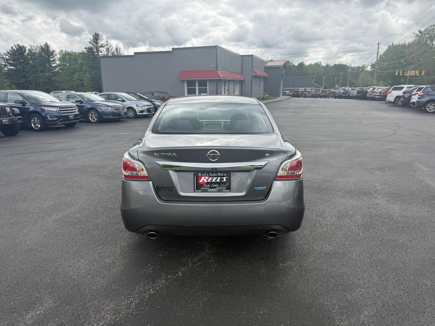 2015 Gray /Black Nissan Altima 2.5 S (1N4AL3AP0FC) with an 2.5L I4 DOHC 16V engine, Automatic transmission, located at 11115 Chardon Rd. , Chardon, OH, 44024, (440) 214-9705, 41.580246, -81.241943 - This One Owner 2015 Nissan Altima is an incredibly fuel efficient commuter sedan. Powered by a 2.5 I4 engine it gets 31 MPG combined and up to 37 MPG highway. On the side you get a power drivers seat, push button start, a sport driving mode, and an aux audio input. This Altima is fully serviced and - Photo#8