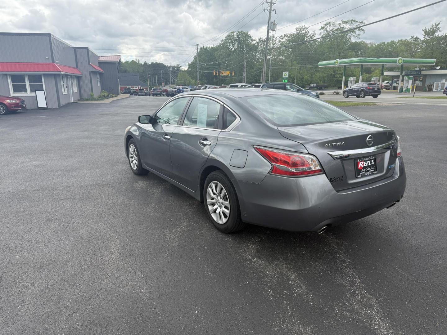 2015 Gray /Black Nissan Altima 2.5 S (1N4AL3AP0FC) with an 2.5L I4 DOHC 16V engine, Automatic transmission, located at 11115 Chardon Rd. , Chardon, OH, 44024, (440) 214-9705, 41.580246, -81.241943 - This One Owner 2015 Nissan Altima is an incredibly fuel efficient commuter sedan. Powered by a 2.5 I4 engine it gets 31 MPG combined and up to 37 MPG highway. On the side you get a power drivers seat, push button start, a sport driving mode, and an aux audio input. This Altima is fully serviced and - Photo#9