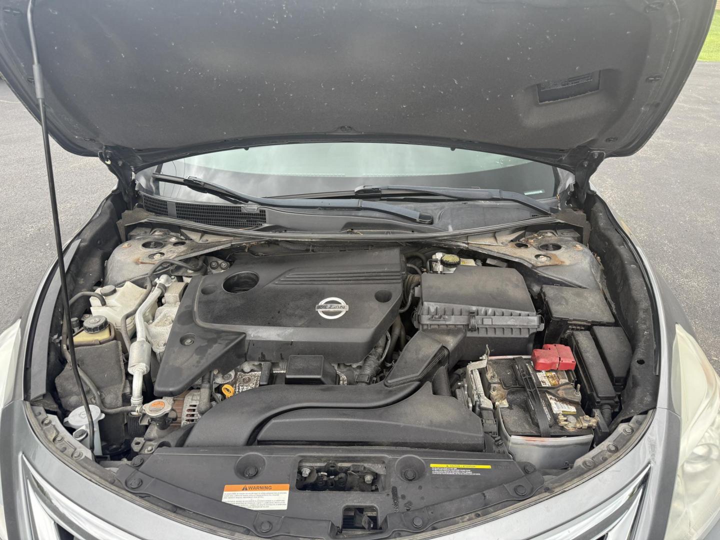 2015 Gray /Black Nissan Altima 2.5 S (1N4AL3AP0FC) with an 2.5L I4 DOHC 16V engine, Automatic transmission, located at 11115 Chardon Rd. , Chardon, OH, 44024, (440) 214-9705, 41.580246, -81.241943 - This One Owner 2015 Nissan Altima is an incredibly fuel efficient commuter sedan. Powered by a 2.5 I4 engine it gets 31 MPG combined and up to 37 MPG highway. On the side you get a power drivers seat, push button start, a sport driving mode, and an aux audio input. This Altima is fully serviced and - Photo#14