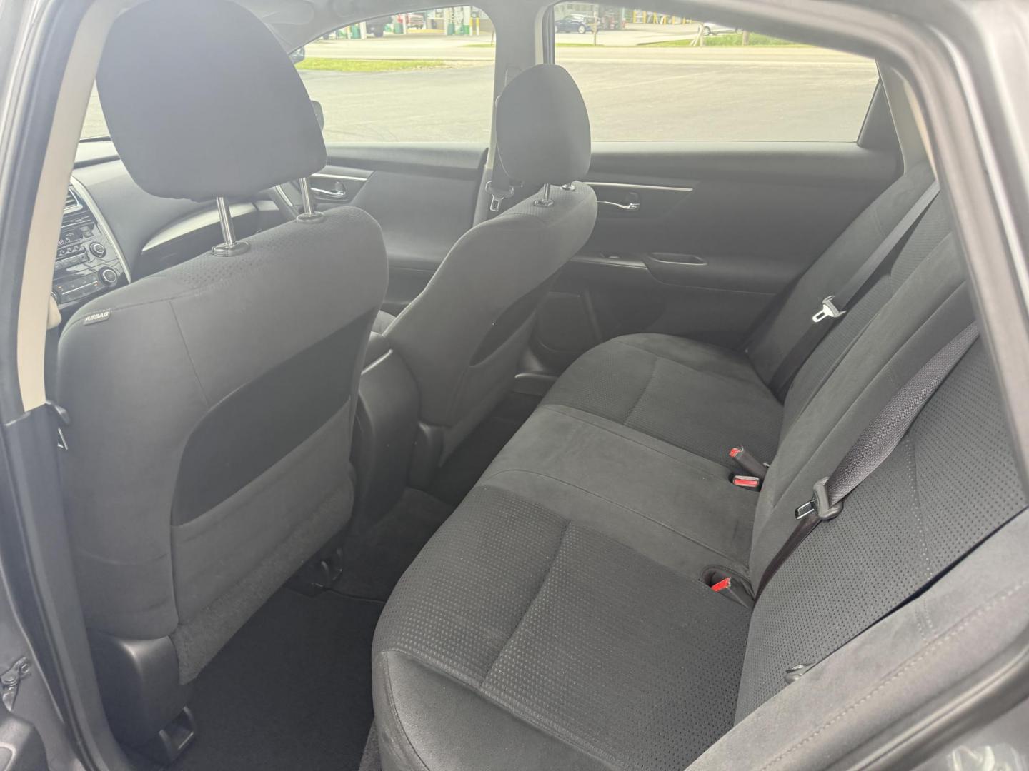2015 Gray /Black Nissan Altima 2.5 S (1N4AL3AP0FC) with an 2.5L I4 DOHC 16V engine, Automatic transmission, located at 11115 Chardon Rd. , Chardon, OH, 44024, (440) 214-9705, 41.580246, -81.241943 - This One Owner 2015 Nissan Altima is an incredibly fuel efficient commuter sedan. Powered by a 2.5 I4 engine it gets 31 MPG combined and up to 37 MPG highway. On the side you get a power drivers seat, push button start, a sport driving mode, and an aux audio input. This Altima is fully serviced and - Photo#26