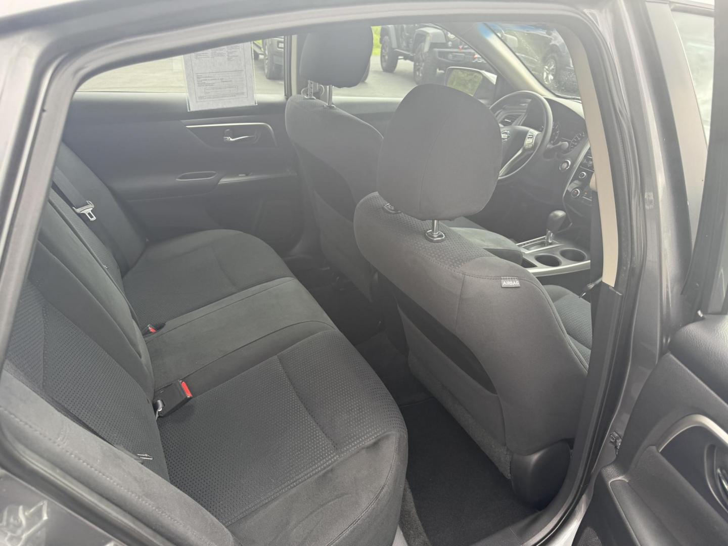 2015 Gray /Black Nissan Altima 2.5 S (1N4AL3AP0FC) with an 2.5L I4 DOHC 16V engine, Automatic transmission, located at 11115 Chardon Rd. , Chardon, OH, 44024, (440) 214-9705, 41.580246, -81.241943 - This One Owner 2015 Nissan Altima is an incredibly fuel efficient commuter sedan. Powered by a 2.5 I4 engine it gets 31 MPG combined and up to 37 MPG highway. On the side you get a power drivers seat, push button start, a sport driving mode, and an aux audio input. This Altima is fully serviced and - Photo#32