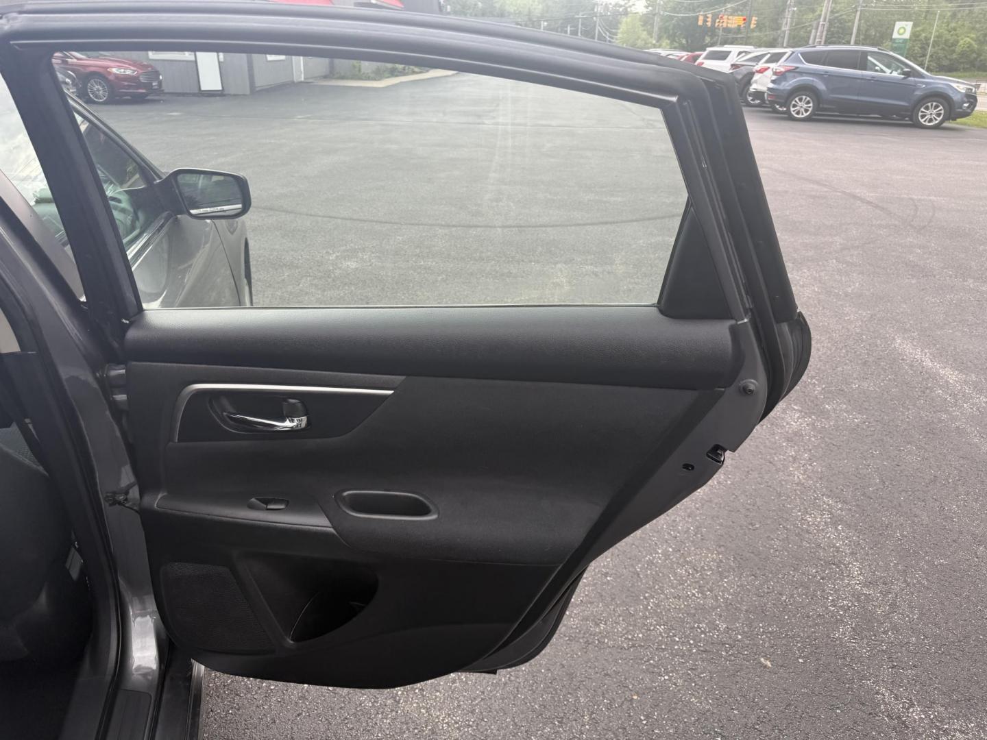2015 Gray /Black Nissan Altima 2.5 S (1N4AL3AP0FC) with an 2.5L I4 DOHC 16V engine, Automatic transmission, located at 11115 Chardon Rd. , Chardon, OH, 44024, (440) 214-9705, 41.580246, -81.241943 - This One Owner 2015 Nissan Altima is an incredibly fuel efficient commuter sedan. Powered by a 2.5 I4 engine it gets 31 MPG combined and up to 37 MPG highway. On the side you get a power drivers seat, push button start, a sport driving mode, and an aux audio input. This Altima is fully serviced and - Photo#33