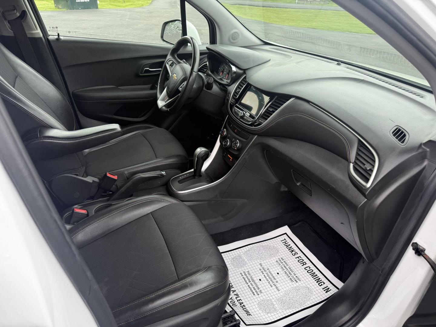 2018 White /Black Chevrolet Trax LT AWD (KL7CJPSBXJB) with an 1.4L I4 DOHC 16V Turbo engine, 6A transmission, located at 11115 Chardon Rd. , Chardon, OH, 44024, (440) 214-9705, 41.580246, -81.241943 - This One Owner 2018 Chevrolet Trax LT AWD is a great little fuel SUV. Powered by a 1.4 I4 Turbocharged ECOTEC engine and a 6 speed automatic transmission this little Trax achieves up to 30 MPG highway making it a great choice for any commuter. On the inside this Trax has a power drivers seat, push b - Photo#31