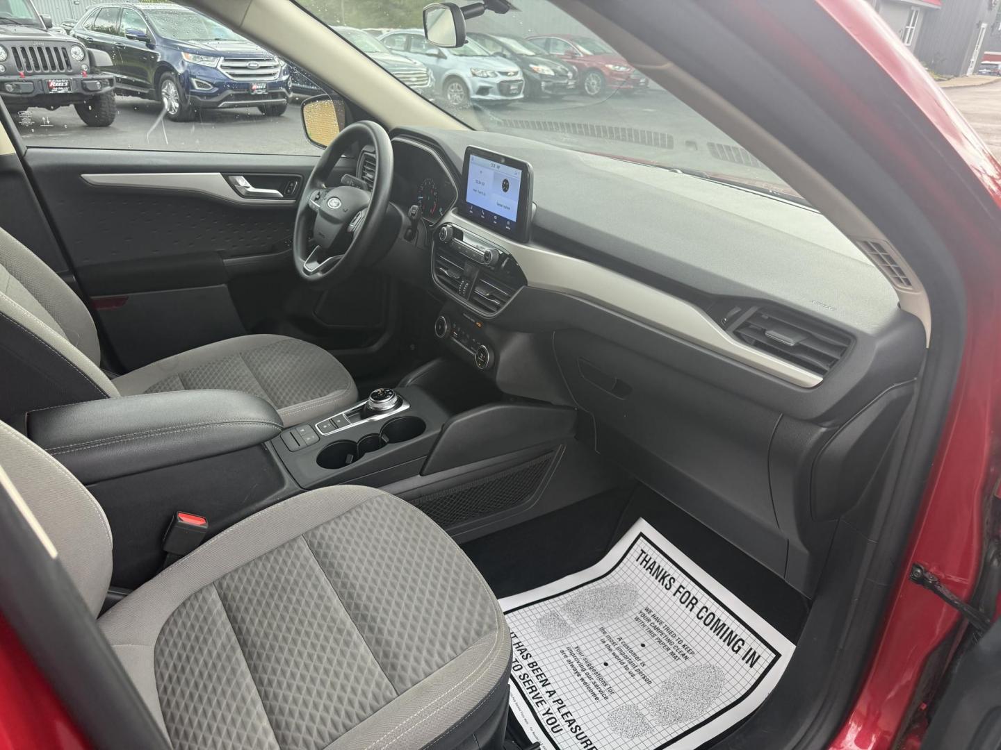 2020 Red /Black Ford Escape SE AWD (1FMCU9G68LU) with an 1.5L I3 DOHC 12V TURBO engine, 8-Speed Automatic transmission, located at 11115 Chardon Rd. , Chardon, OH, 44024, (440) 214-9705, 41.580246, -81.241943 - This 2020 Ford Escape SE is a modern and fuel efficient SUV. Equipped with a 1.5 I3 Turbocharged EcoBoost engine and a 8 speed automatic transmission this Escape achieves a very impressive 28 MPG combined and 31 MPG highway. On the inside it has a power drivers seat, heated front seats and, automati - Photo#36