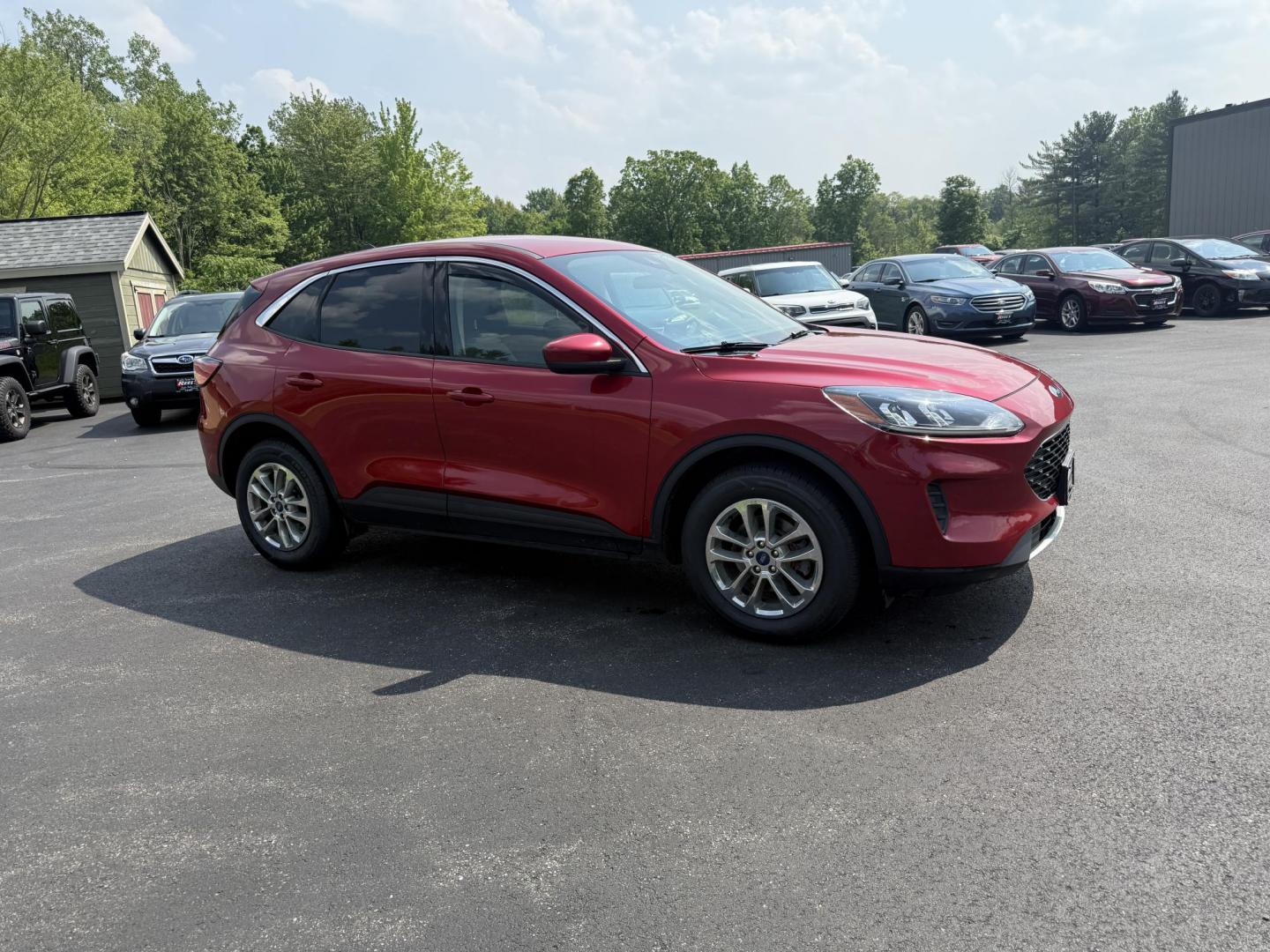 2020 Red /Black Ford Escape SE AWD (1FMCU9G68LU) with an 1.5L I3 DOHC 12V TURBO engine, 8-Speed Automatic transmission, located at 11115 Chardon Rd. , Chardon, OH, 44024, (440) 214-9705, 41.580246, -81.241943 - This 2020 Ford Escape SE is a modern and fuel efficient SUV. Equipped with a 1.5 I3 Turbocharged EcoBoost engine and a 8 speed automatic transmission this Escape achieves a very impressive 28 MPG combined and 31 MPG highway. On the inside it has a power drivers seat, heated front seats and, automati - Photo#3