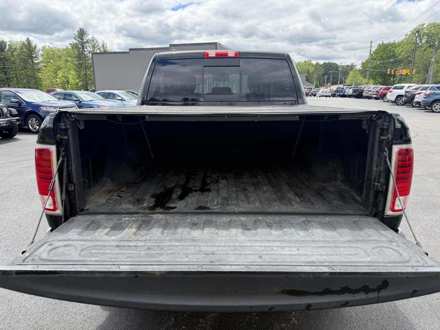 2014 Black /Black RAM 1500 Laramie Crew Cab SWB 4WD (1C6RR7NT3ES) with an 5.7L V8 OHV 16V engine, 8-Speed Automatic transmission, located at 11115 Chardon Rd. , Chardon, OH, 44024, (440) 214-9705, 41.580246, -81.241943 - FRESH TRADE ALERT ---- This 2014 Ram 1500 is a luxurious pickup truck with plenty of capability. Powered by a 5.7 HEMI V8, 8 speed automatic transmission and, 3.93 gearing this Ram is rated to tow 10,300 pounds. On the inside you'll find a beautiful leather wrapped interior with heated and cooled fr - Photo#6