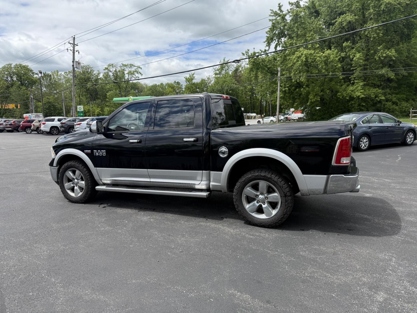 2014 Black /Black RAM 1500 Laramie Crew Cab SWB 4WD (1C6RR7NT3ES) with an 5.7L V8 OHV 16V engine, 8-Speed Automatic transmission, located at 11115 Chardon Rd. , Chardon, OH, 44024, (440) 214-9705, 41.580246, -81.241943 - FRESH TRADE ALERT ---- This 2014 Ram 1500 is a luxurious pickup truck with plenty of capability. Powered by a 5.7 HEMI V8, 8 speed automatic transmission and, 3.93 gearing this Ram is rated to tow 10,300 pounds. On the inside you'll find a beautiful leather wrapped interior with heated and cooled fr - Photo#7