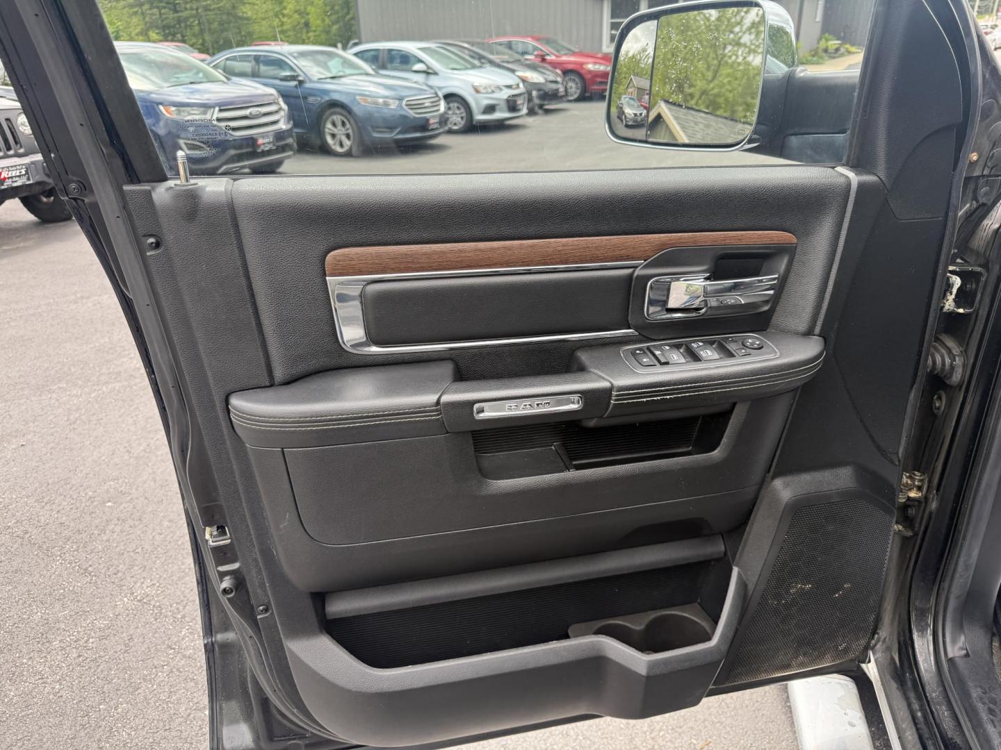 2014 Black /Black RAM 1500 Laramie Crew Cab SWB 4WD (1C6RR7NT3ES) with an 5.7L V8 OHV 16V engine, 8-Speed Automatic transmission, located at 11115 Chardon Rd. , Chardon, OH, 44024, (440) 214-9705, 41.580246, -81.241943 - FRESH TRADE ALERT ---- This 2014 Ram 1500 is a luxurious pickup truck with plenty of capability. Powered by a 5.7 HEMI V8, 8 speed automatic transmission and, 3.93 gearing this Ram is rated to tow 10,300 pounds. On the inside you'll find a beautiful leather wrapped interior with heated and cooled fr - Photo#13