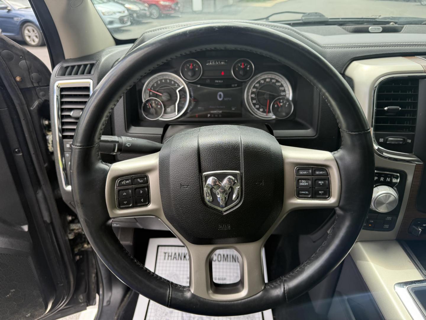 2014 Black /Black RAM 1500 Laramie Crew Cab SWB 4WD (1C6RR7NT3ES) with an 5.7L V8 OHV 16V engine, 8-Speed Automatic transmission, located at 11115 Chardon Rd. , Chardon, OH, 44024, (440) 214-9705, 41.580246, -81.241943 - FRESH TRADE ALERT ---- This 2014 Ram 1500 is a luxurious pickup truck with plenty of capability. Powered by a 5.7 HEMI V8, 8 speed automatic transmission and, 3.93 gearing this Ram is rated to tow 10,300 pounds. On the inside you'll find a beautiful leather wrapped interior with heated and cooled fr - Photo#23