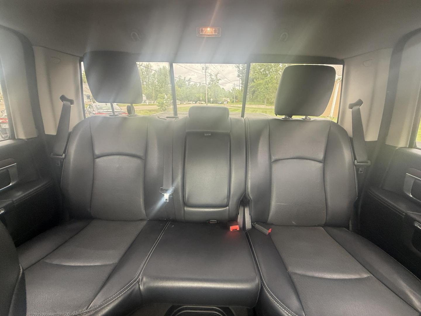 2014 Black /Black RAM 1500 Laramie Crew Cab SWB 4WD (1C6RR7NT3ES) with an 5.7L V8 OHV 16V engine, 8-Speed Automatic transmission, located at 11115 Chardon Rd. , Chardon, OH, 44024, (440) 214-9705, 41.580246, -81.241943 - FRESH TRADE ALERT ---- This 2014 Ram 1500 is a luxurious pickup truck with plenty of capability. Powered by a 5.7 HEMI V8, 8 speed automatic transmission and, 3.93 gearing this Ram is rated to tow 10,300 pounds. On the inside you'll find a beautiful leather wrapped interior with heated and cooled fr - Photo#33