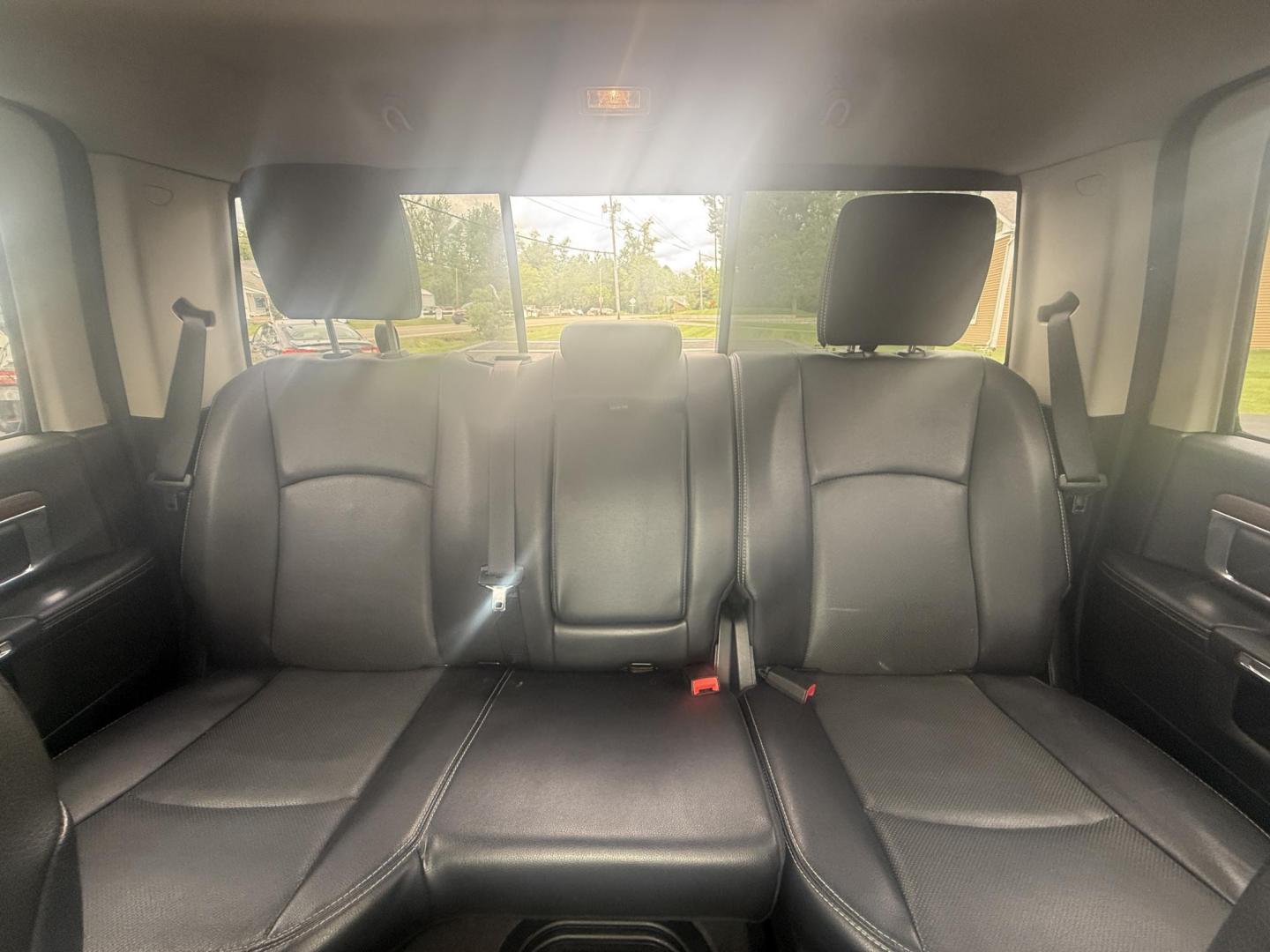 2014 Black /Black RAM 1500 Laramie Crew Cab SWB 4WD (1C6RR7NT3ES) with an 5.7L V8 OHV 16V engine, 8-Speed Automatic transmission, located at 11115 Chardon Rd. , Chardon, OH, 44024, (440) 214-9705, 41.580246, -81.241943 - FRESH TRADE ALERT ---- This 2014 Ram 1500 is a luxurious pickup truck with plenty of capability. Powered by a 5.7 HEMI V8, 8 speed automatic transmission and, 3.93 gearing this Ram is rated to tow 10,300 pounds. On the inside you'll find a beautiful leather wrapped interior with heated and cooled fr - Photo#34
