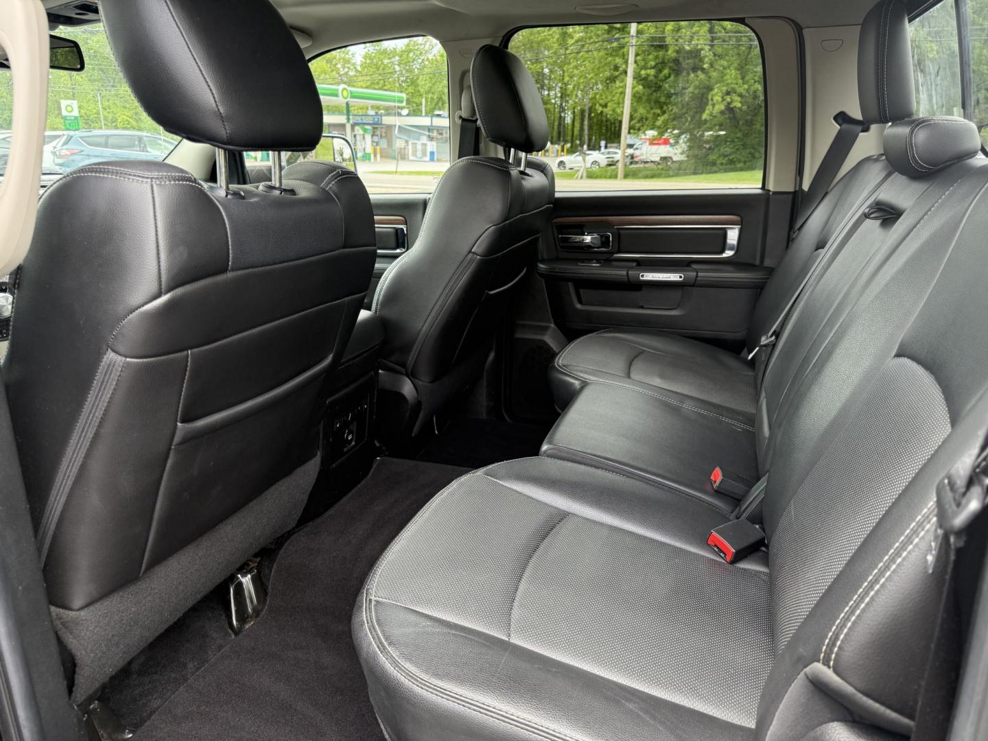 2014 Black /Black RAM 1500 Laramie Crew Cab SWB 4WD (1C6RR7NT3ES) with an 5.7L V8 OHV 16V engine, 8-Speed Automatic transmission, located at 11115 Chardon Rd. , Chardon, OH, 44024, (440) 214-9705, 41.580246, -81.241943 - FRESH TRADE ALERT ---- This 2014 Ram 1500 is a luxurious pickup truck with plenty of capability. Powered by a 5.7 HEMI V8, 8 speed automatic transmission and, 3.93 gearing this Ram is rated to tow 10,300 pounds. On the inside you'll find a beautiful leather wrapped interior with heated and cooled fr - Photo#35