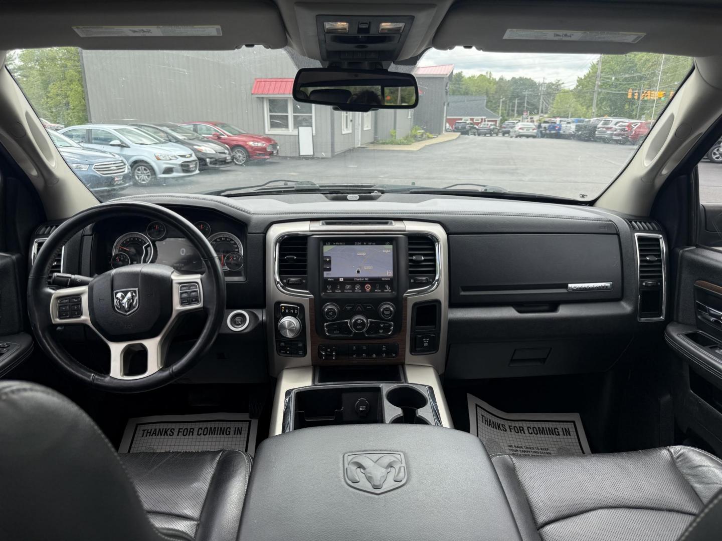 2014 Black /Black RAM 1500 Laramie Crew Cab SWB 4WD (1C6RR7NT3ES) with an 5.7L V8 OHV 16V engine, 8-Speed Automatic transmission, located at 11115 Chardon Rd. , Chardon, OH, 44024, (440) 214-9705, 41.580246, -81.241943 - FRESH TRADE ALERT ---- This 2014 Ram 1500 is a luxurious pickup truck with plenty of capability. Powered by a 5.7 HEMI V8, 8 speed automatic transmission and, 3.93 gearing this Ram is rated to tow 10,300 pounds. On the inside you'll find a beautiful leather wrapped interior with heated and cooled fr - Photo#38