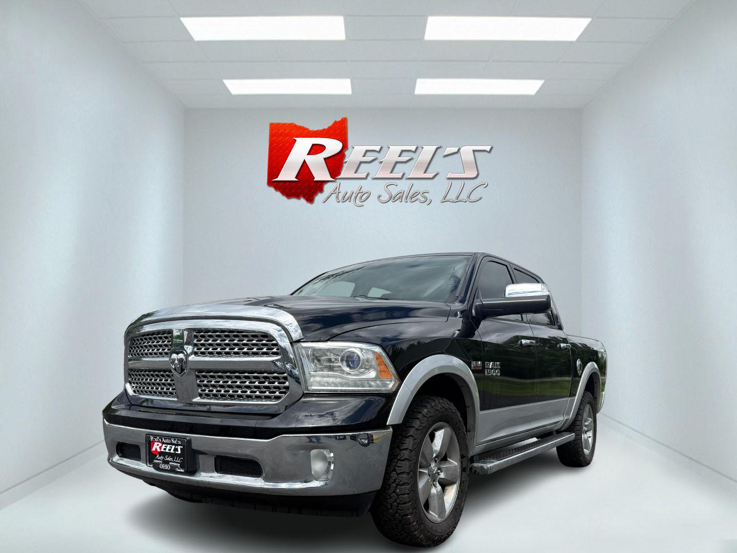 2014 Black /Black RAM 1500 Laramie Crew Cab SWB 4WD (1C6RR7NT3ES) with an 5.7L V8 OHV 16V engine, 8-Speed Automatic transmission, located at 11115 Chardon Rd. , Chardon, OH, 44024, (440) 214-9705, 41.580246, -81.241943 - FRESH TRADE ALERT ---- This 2014 Ram 1500 is a luxurious pickup truck with plenty of capability. Powered by a 5.7 HEMI V8, 8 speed automatic transmission and, 3.93 gearing this Ram is rated to tow 10,300 pounds. On the inside you'll find a beautiful leather wrapped interior with heated and cooled fr - Photo#0