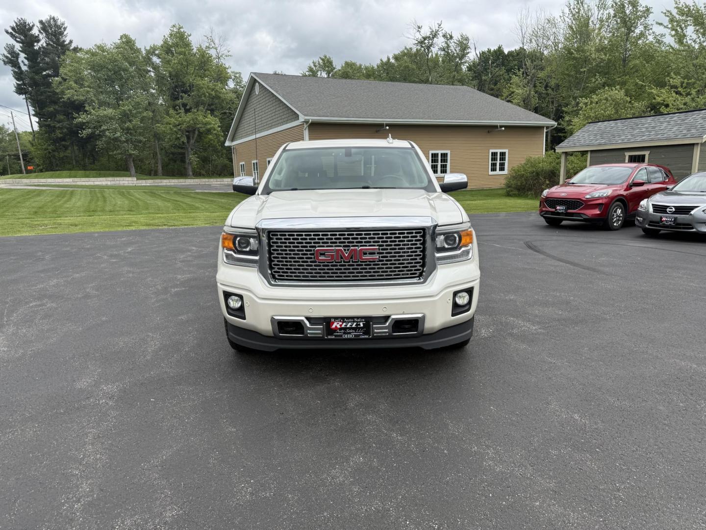 2015 White /Brown GMC Sierra 1500 Denali Crew Cab Short Box 4WD (3GTU2WEJ7FG) with an 6.2L V8 OHV 16V engine, 8-Speed Automatic transmission, located at 11115 Chardon Rd. , Chardon, OH, 44024, (440) 214-9705, 41.580246, -81.241943 - This 2015 GMC Sierra 1500 Denali is GM's greatest they have to offer. Powered by a 6.2 V8 Engine and an 8 speed automatic transmission this truck is rated to tow 9,200 pounds while giving you all the luxury of a Cadillac. On the inside you will find an incredible leather interior, heated and cooled - Photo#1