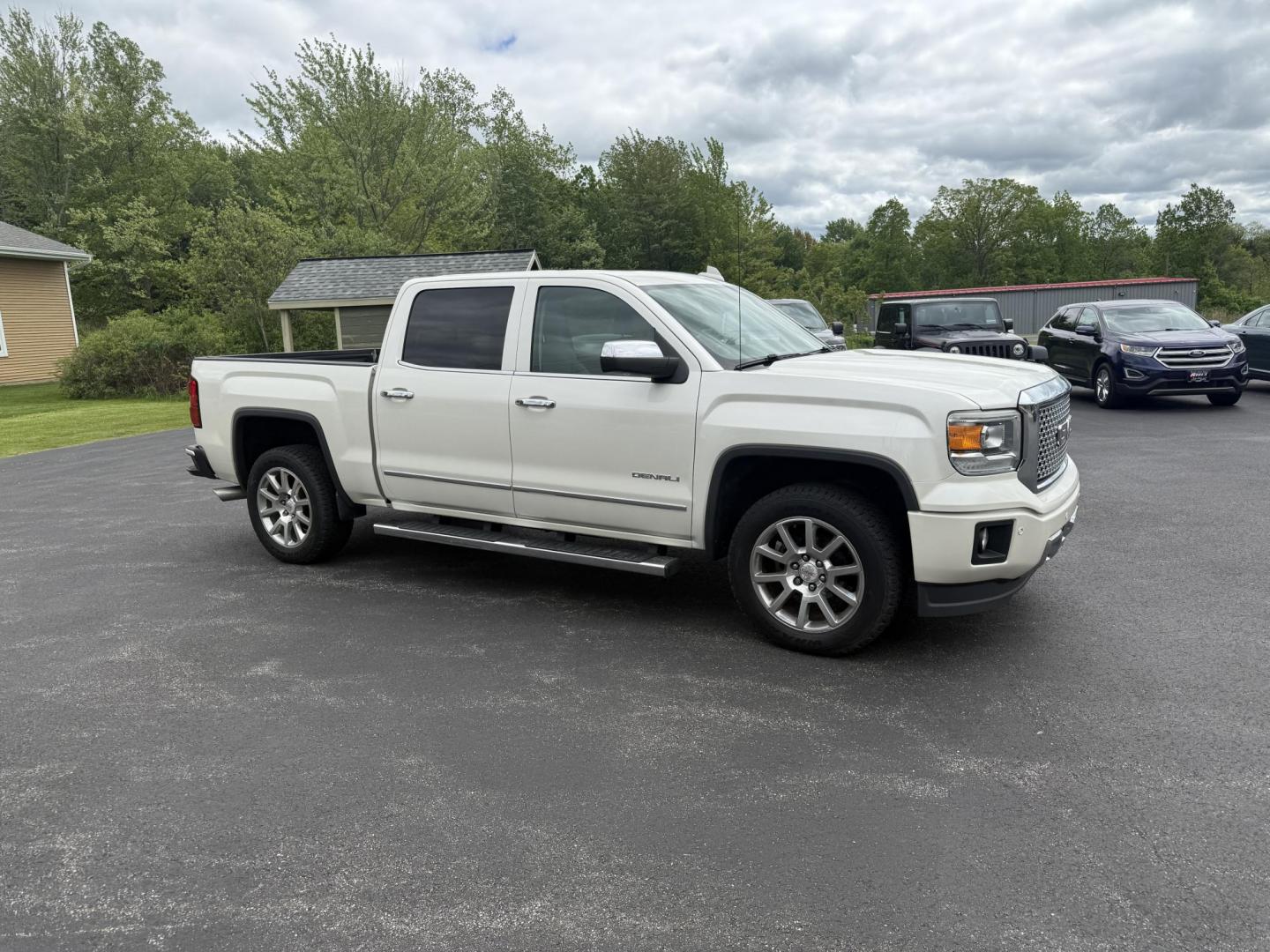 2015 White /Brown GMC Sierra 1500 Denali Crew Cab Short Box 4WD (3GTU2WEJ7FG) with an 6.2L V8 OHV 16V engine, 8-Speed Automatic transmission, located at 11115 Chardon Rd. , Chardon, OH, 44024, (440) 214-9705, 41.580246, -81.241943 - This 2015 GMC Sierra 1500 Denali is GM's greatest they have to offer. Powered by a 6.2 V8 Engine and an 8 speed automatic transmission this truck is rated to tow 9,200 pounds while giving you all the luxury of a Cadillac. On the inside you will find an incredible leather interior, heated and cooled - Photo#3