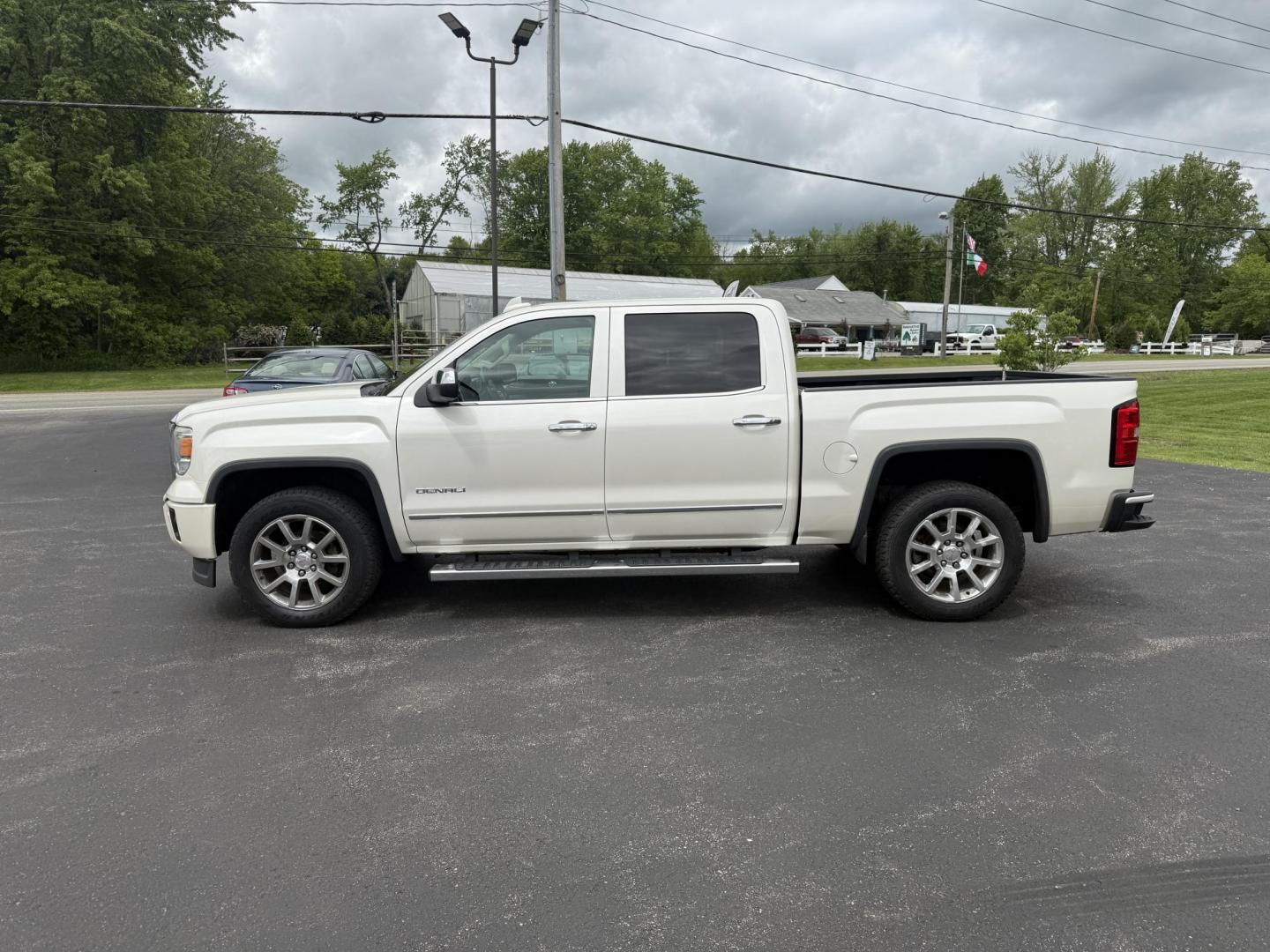 2015 White /Brown GMC Sierra 1500 Denali Crew Cab Short Box 4WD (3GTU2WEJ7FG) with an 6.2L V8 OHV 16V engine, 8-Speed Automatic transmission, located at 11115 Chardon Rd. , Chardon, OH, 44024, (440) 214-9705, 41.580246, -81.241943 - This 2015 GMC Sierra 1500 Denali is GM's greatest they have to offer. Powered by a 6.2 V8 Engine and an 8 speed automatic transmission this truck is rated to tow 9,200 pounds while giving you all the luxury of a Cadillac. On the inside you will find an incredible leather interior, heated and cooled - Photo#13