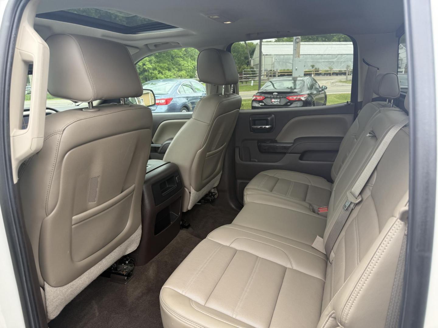 2015 White /Brown GMC Sierra 1500 Denali Crew Cab Short Box 4WD (3GTU2WEJ7FG) with an 6.2L V8 OHV 16V engine, 8-Speed Automatic transmission, located at 11115 Chardon Rd. , Chardon, OH, 44024, (440) 214-9705, 41.580246, -81.241943 - This 2015 GMC Sierra 1500 Denali is GM's greatest they have to offer. Powered by a 6.2 V8 Engine and an 8 speed automatic transmission this truck is rated to tow 9,200 pounds while giving you all the luxury of a Cadillac. On the inside you will find an incredible leather interior, heated and cooled - Photo#33