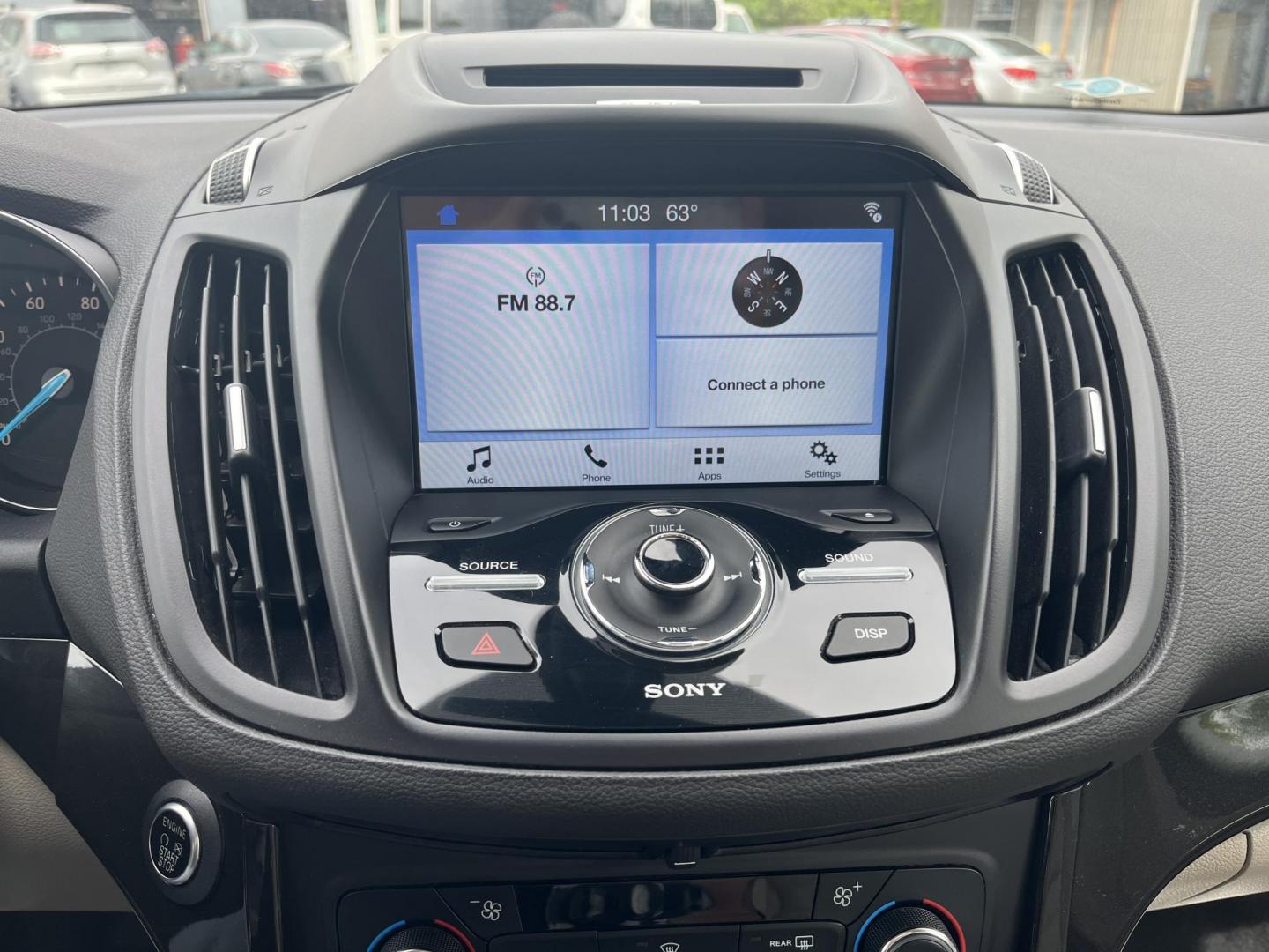 2017 Gold /Gray Ford Escape Titanium 4WD (1FMCU9J96HU) with an 2.0L I4 DOHC 16V Turbo engine, 6A transmission, located at 547 E. Main St., Orwell, OH, 44076, (440) 437-5893, 41.535435, -80.847855 - This One Owner 2017 Ford Escape Titanium is a feature rich compact SUV. Powered by a 2.0 I4 Turbocharged EcoBoost engine and a 6 speed automatic transmission this Escape is quick and fuel efficient achieving an EPA estimated 27 MPG highway. On the inside you get a leather wrapped interior, power fro - Photo#14