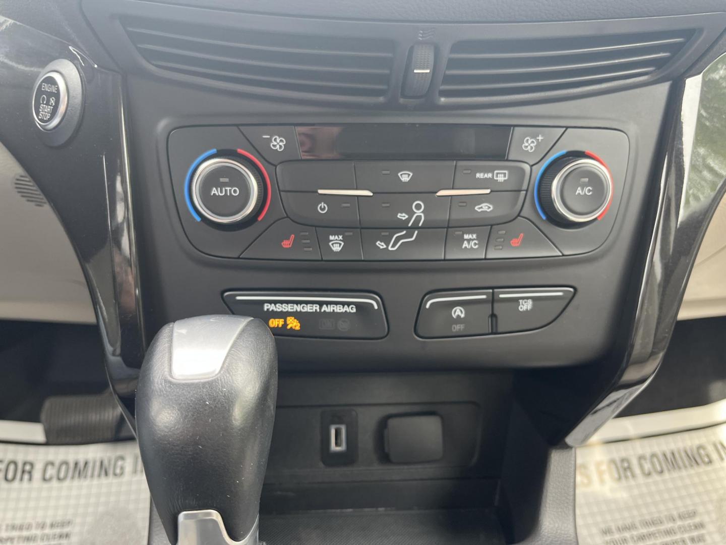 2017 Gold /Gray Ford Escape Titanium 4WD (1FMCU9J96HU) with an 2.0L I4 DOHC 16V Turbo engine, 6A transmission, located at 547 E. Main St., Orwell, OH, 44076, (440) 437-5893, 41.535435, -80.847855 - This One Owner 2017 Ford Escape Titanium is a feature rich compact SUV. Powered by a 2.0 I4 Turbocharged EcoBoost engine and a 6 speed automatic transmission this Escape is quick and fuel efficient achieving an EPA estimated 27 MPG highway. On the inside you get a leather wrapped interior, power fro - Photo#16