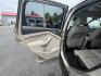 2017 Gold /Gray Ford Escape Titanium 4WD (1FMCU9J96HU) with an 2.0L I4 DOHC 16V Turbo engine, 6A transmission, located at 547 E. Main St., Orwell, OH, 44076, (440) 437-5893, 41.535435, -80.847855 - This One Owner 2017 Ford Escape Titanium is a feature rich compact SUV. Powered by a 2.0 I4 Turbocharged EcoBoost engine and a 6 speed automatic transmission this Escape is quick and fuel efficient achieving an EPA estimated 27 MPG highway. On the inside you get a leather wrapped interior, power fro - Photo#24