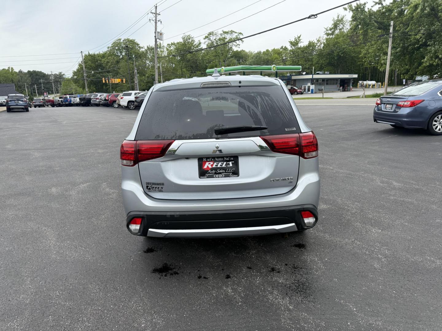 2017 Silver /Black Mitsubishi Outlander SE AWD (JA4AZ3A38HZ) with an 2.4L I4 DOHC 16V engine, Automatic transmission, located at 11115 Chardon Rd. , Chardon, OH, 44024, (440) 214-9705, 41.580246, -81.241943 - This 2017 Mitsubishi Outlander SE S-AWC is a fuel efficient all wheel drive SUV with a 3rd row. Powered by a 2.4 I4 Engine it is capable of achieving an impressive 29 MPG Highway. On the inside you get a 7.0" touch screen with Apple Carplay, Android Auto and, a backup camera. Other features include - Photo#8