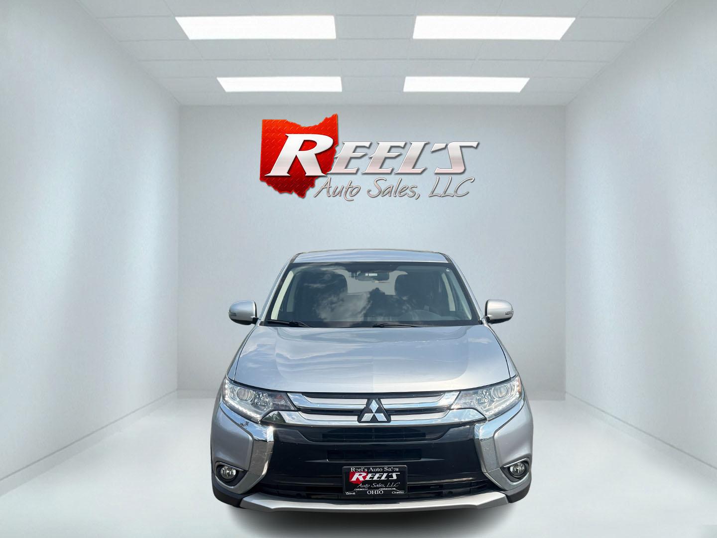 2017 Silver /Black Mitsubishi Outlander SE AWD (JA4AZ3A38HZ) with an 2.4L I4 DOHC 16V engine, Automatic transmission, located at 11115 Chardon Rd. , Chardon, OH, 44024, (440) 214-9705, 41.580246, -81.241943 - This 2017 Mitsubishi Outlander SE S-AWC is a fuel efficient all wheel drive SUV with a 3rd row. Powered by a 2.4 I4 Engine it is capable of achieving an impressive 29 MPG Highway. On the inside you get a 7.0" touch screen with Apple Carplay, Android Auto and, a backup camera. Other features include - Photo#1
