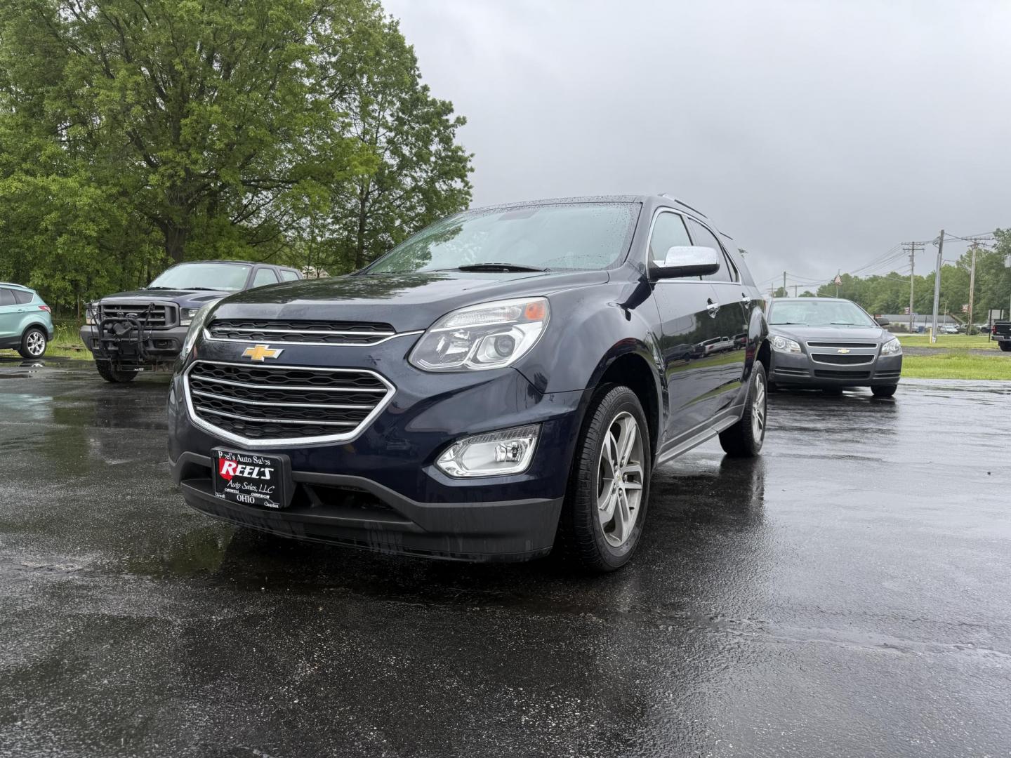 2016 Blue /Black Chevrolet Equinox LTZ 2WD (2GNALDEK1G6) with an 2.4L L4 DOHC 16V engine, 6-Speed Automatic transmission, located at 547 E. Main St., Orwell, OH, 44076, (440) 437-5893, 41.535435, -80.847855 - Photo#0