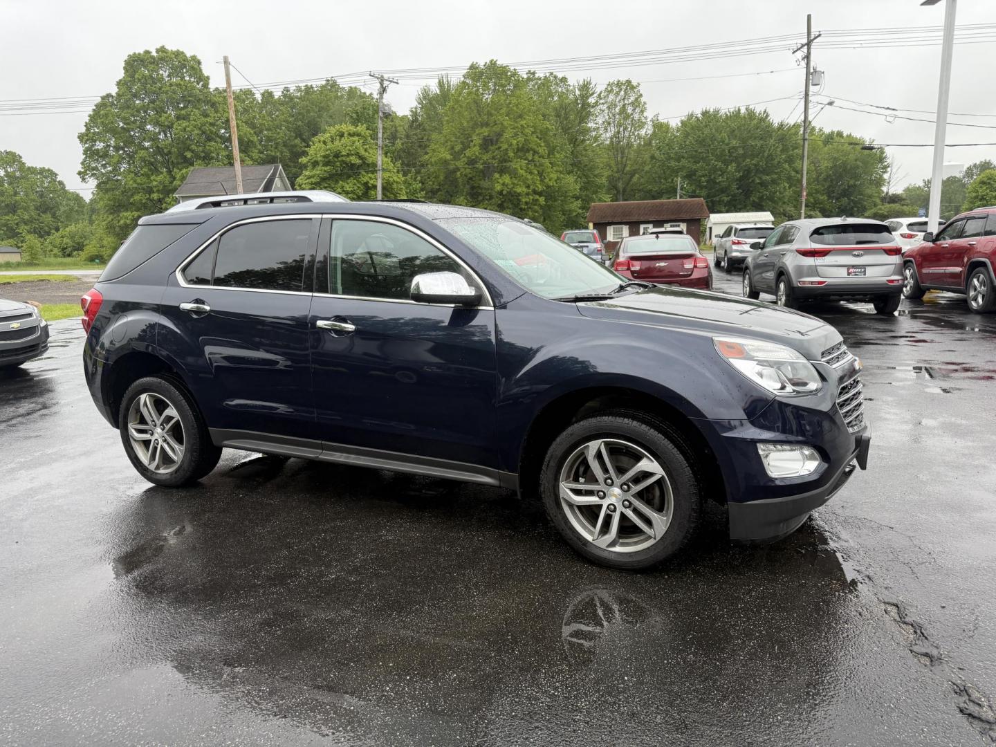 2016 Blue /Black Chevrolet Equinox LTZ 2WD (2GNALDEK1G6) with an 2.4L L4 DOHC 16V engine, 6-Speed Automatic transmission, located at 547 E. Main St., Orwell, OH, 44076, (440) 437-5893, 41.535435, -80.847855 - Photo#3