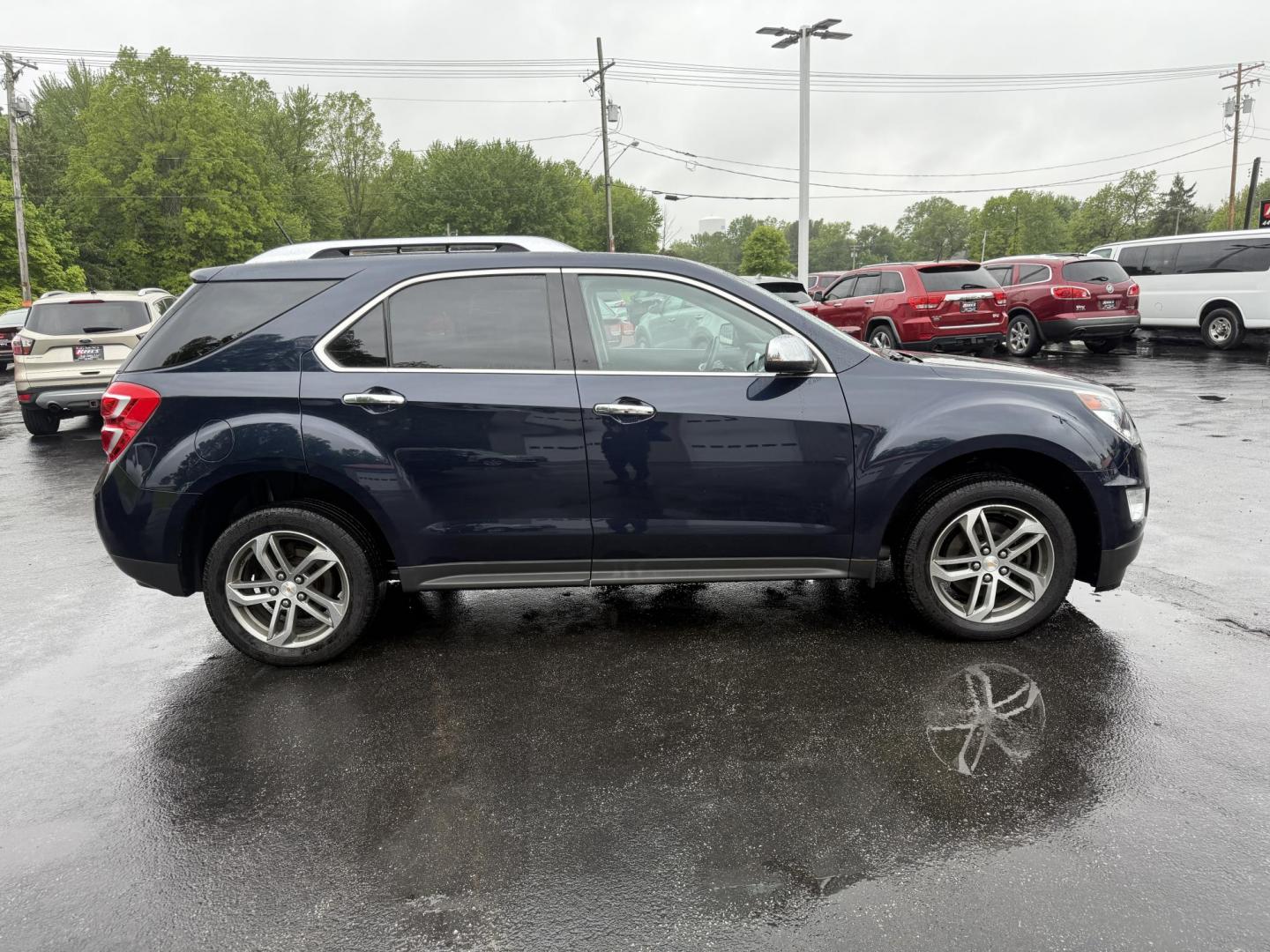 2016 Blue /Black Chevrolet Equinox LTZ 2WD (2GNALDEK1G6) with an 2.4L L4 DOHC 16V engine, 6-Speed Automatic transmission, located at 547 E. Main St., Orwell, OH, 44076, (440) 437-5893, 41.535435, -80.847855 - Photo#5