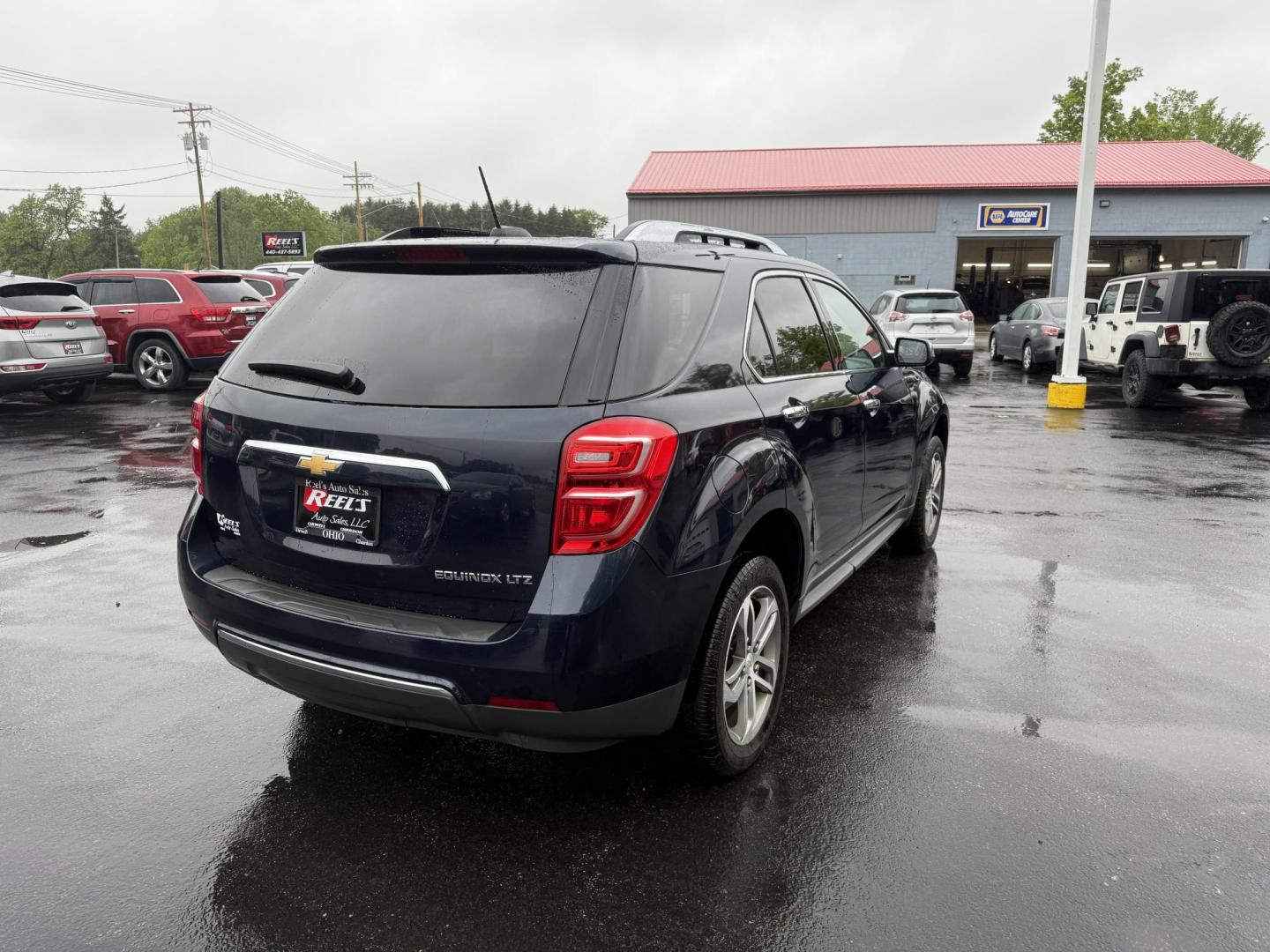 2016 Blue /Black Chevrolet Equinox LTZ 2WD (2GNALDEK1G6) with an 2.4L L4 DOHC 16V engine, 6-Speed Automatic transmission, located at 547 E. Main St., Orwell, OH, 44076, (440) 437-5893, 41.535435, -80.847855 - Photo#7