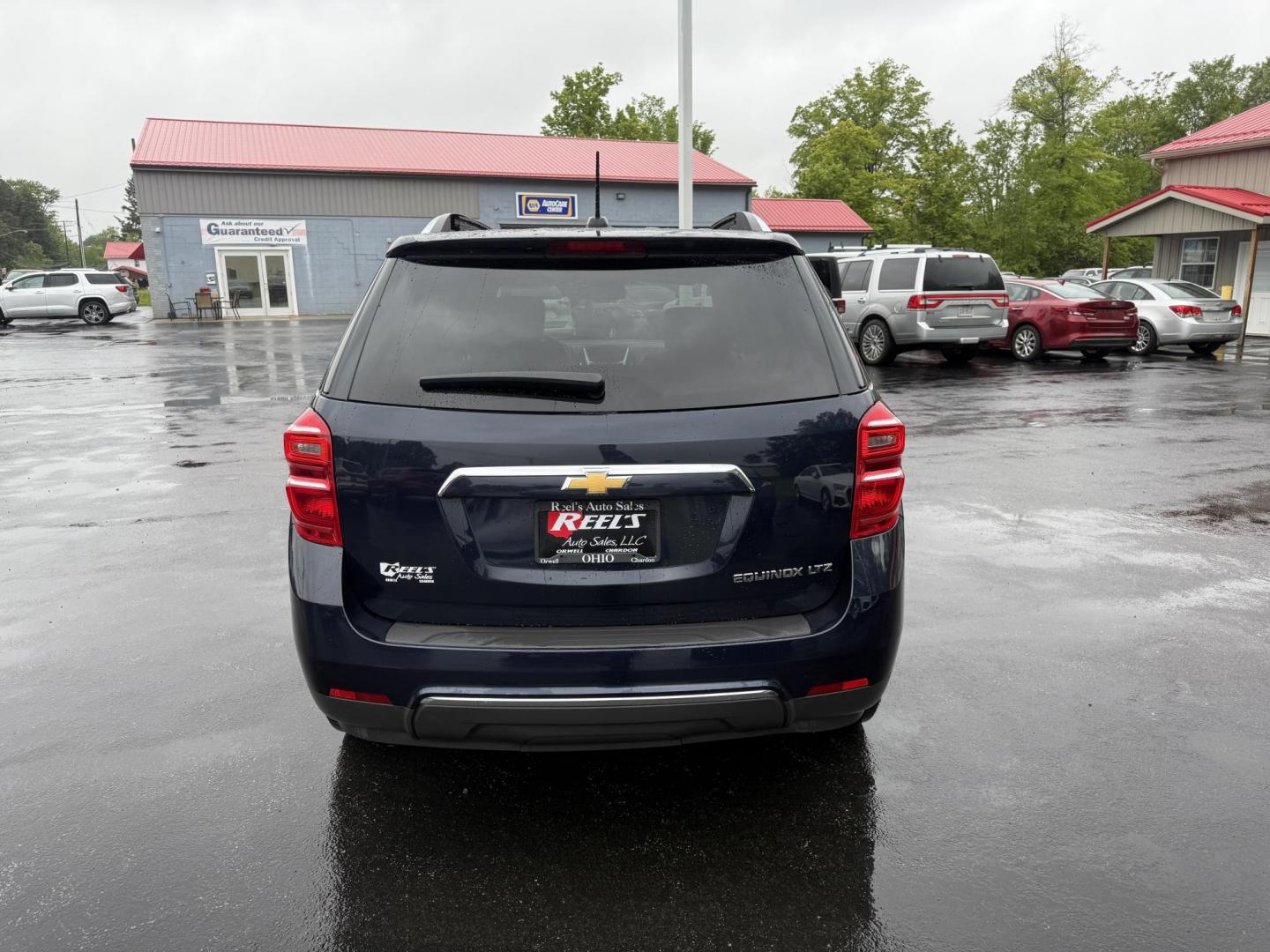 2016 Blue /Black Chevrolet Equinox LTZ 2WD (2GNALDEK1G6) with an 2.4L L4 DOHC 16V engine, 6-Speed Automatic transmission, located at 547 E. Main St., Orwell, OH, 44076, (440) 437-5893, 41.535435, -80.847855 - Photo#8