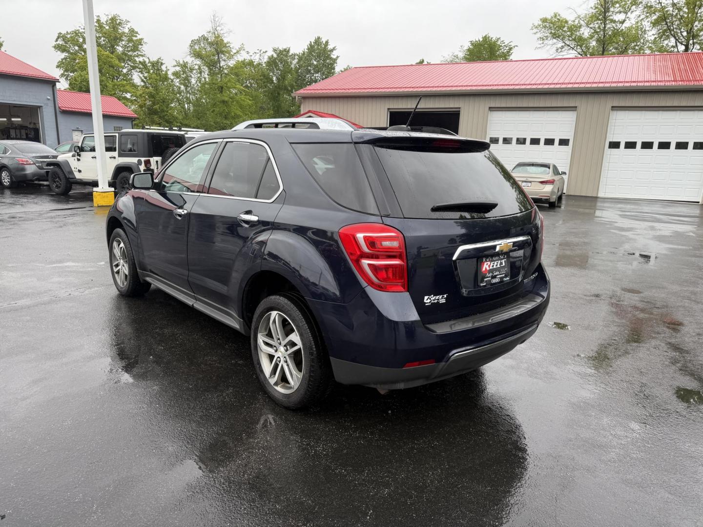 2016 Blue /Black Chevrolet Equinox LTZ 2WD (2GNALDEK1G6) with an 2.4L L4 DOHC 16V engine, 6-Speed Automatic transmission, located at 547 E. Main St., Orwell, OH, 44076, (440) 437-5893, 41.535435, -80.847855 - Photo#9