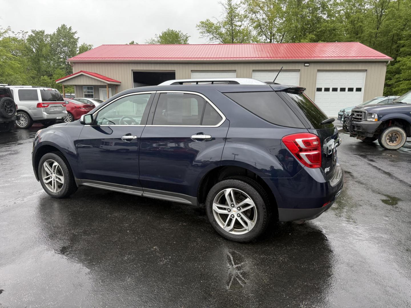 2016 Blue /Black Chevrolet Equinox LTZ 2WD (2GNALDEK1G6) with an 2.4L L4 DOHC 16V engine, 6-Speed Automatic transmission, located at 547 E. Main St., Orwell, OH, 44076, (440) 437-5893, 41.535435, -80.847855 - Photo#10